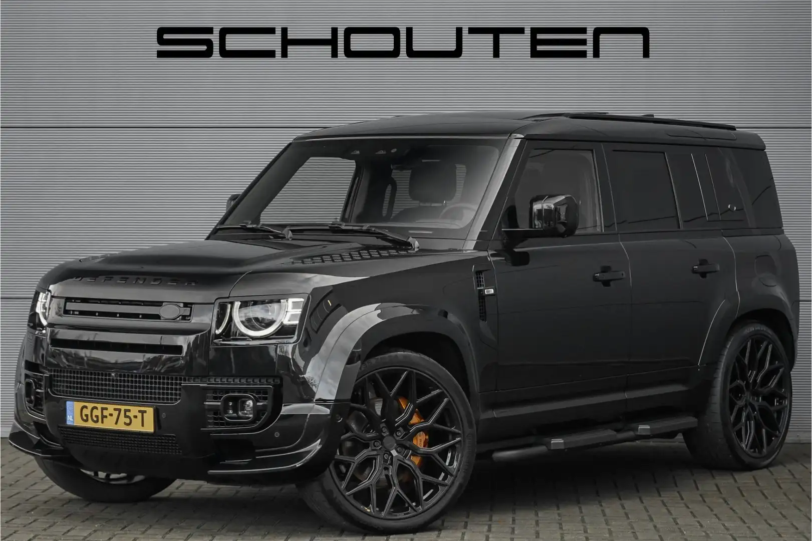 Land Rover Defender 110 2.0 P400e X-Dynamic HSE Urban Widebody 24" Vos Zwart - 1