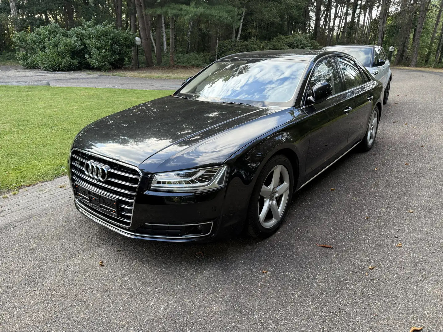Audi A8 50 TDI quattro Pro Line+ Zwart - 1