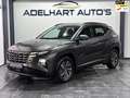 Hyundai TUCSON 1.6 T-GDI MHEV Comfort Automaat / Navigatie full m Gris - thumbnail 1