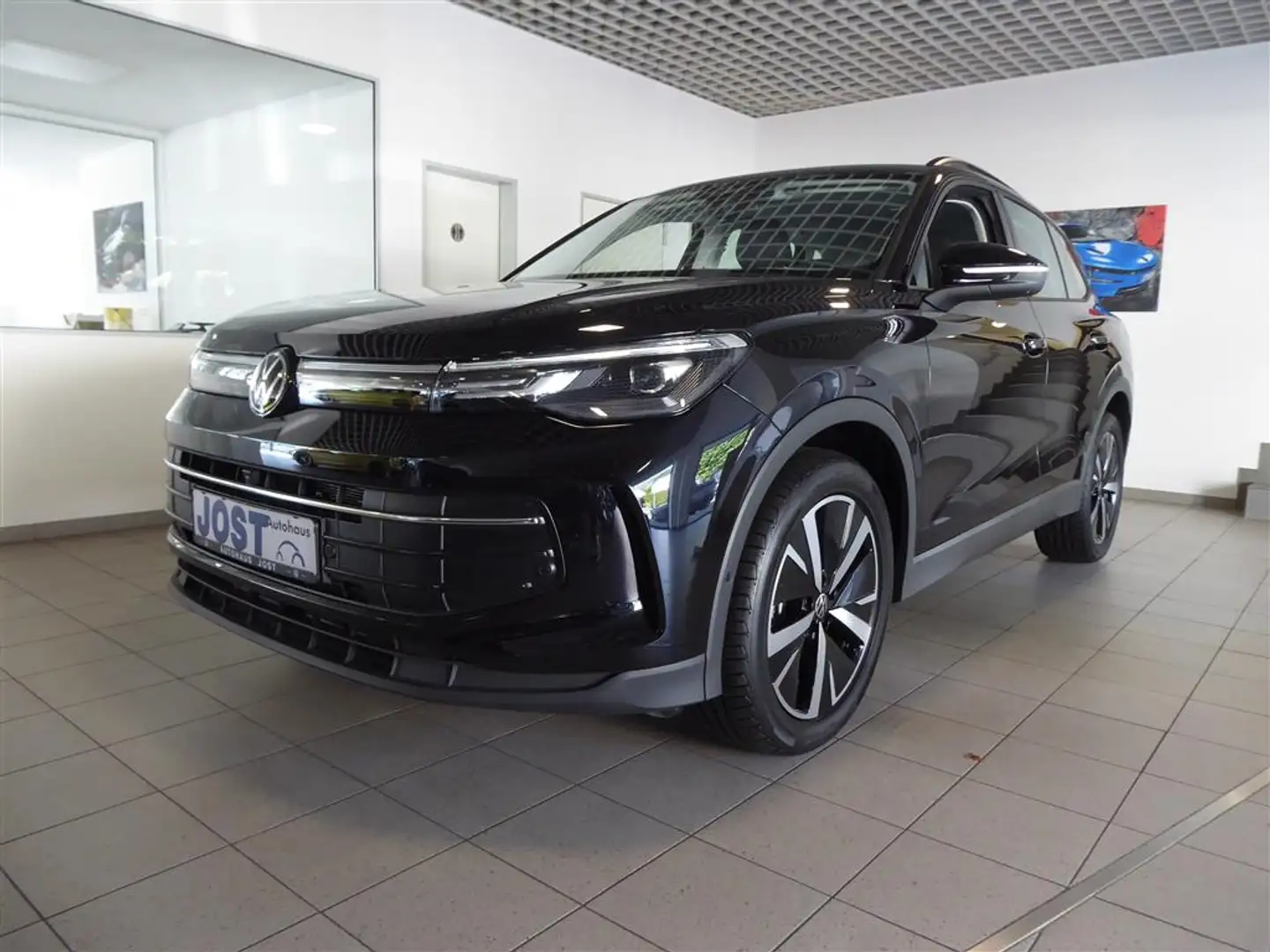 Volkswagen Tiguan Goal 1.5 eTSI DSG Navi AHK Kamera AreaView LM19 Schwarz - 1