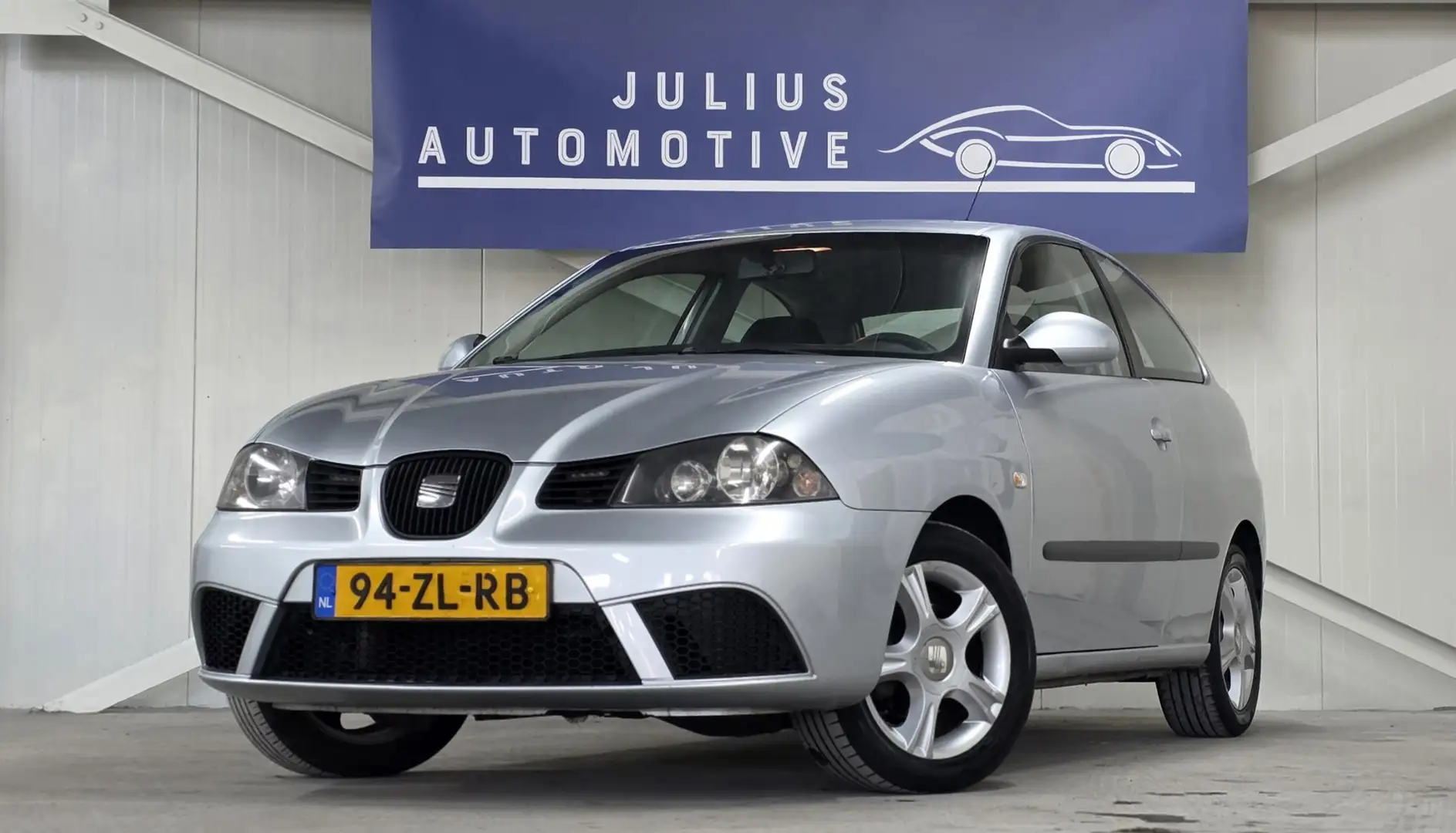SEAT Ibiza 1.4-16V Trendstyle Airco Trekhaak Bluetooth Nieuwe Grijs - 1