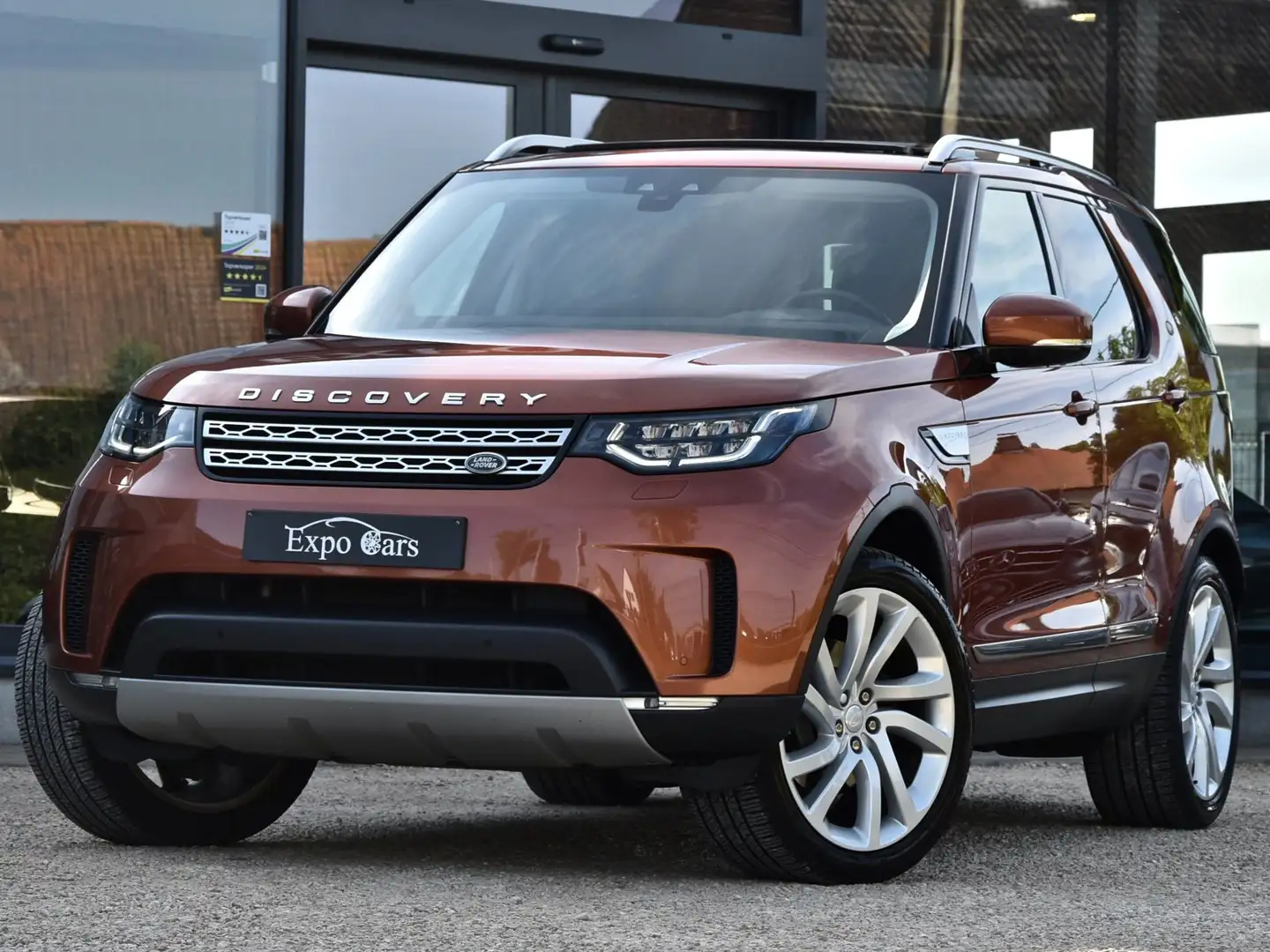 Land Rover Discovery 3.0 TD6 HSE 7pl*PANO DAK*CAMERA*MEMORY*TREKHAAK* Oranje - 1