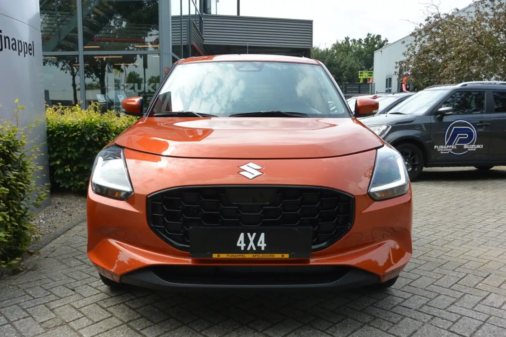 Suzuki Swift 1.2 Style AllGrip (4x4) 5-deurs Smart Hybrid Navig Naranja - 2