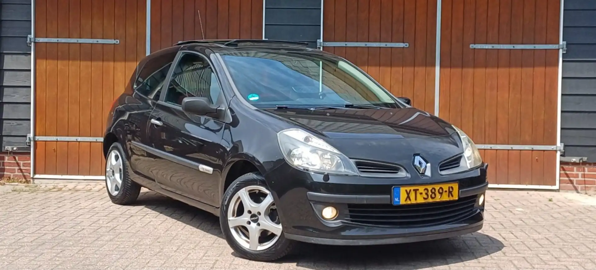 Renault Clio 1.2-16V Rip Curl, Schuifkantel dak, Bluetooth, All Schwarz - 1