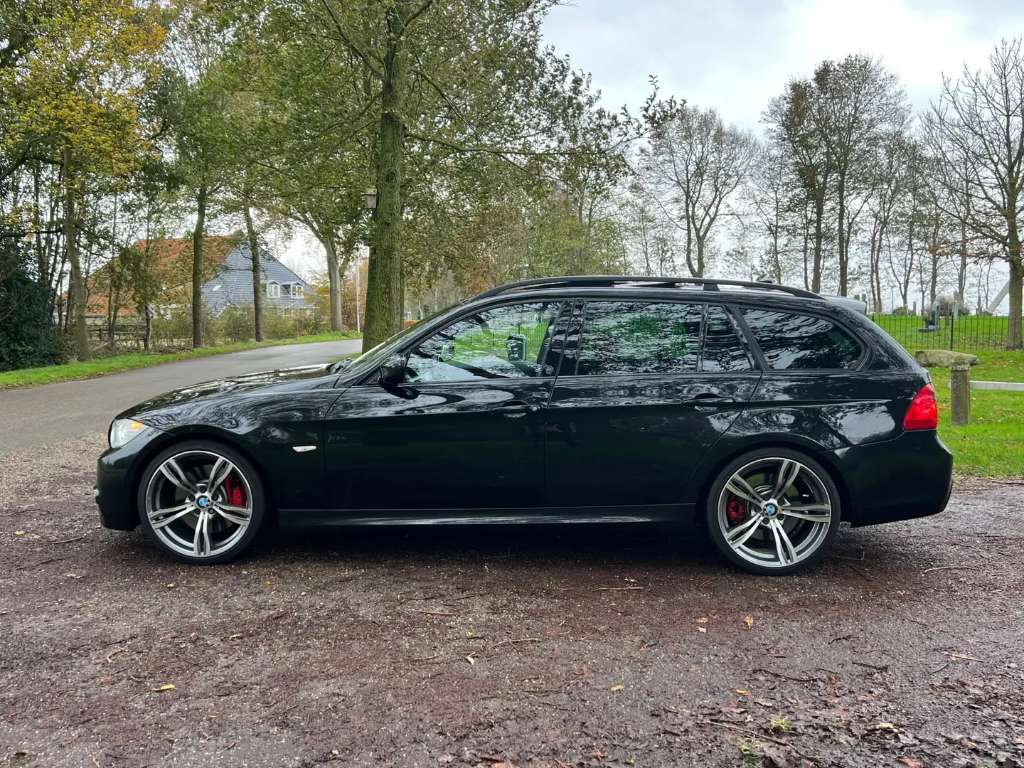BMW 335 3-serie Touring 335i High Executive | Pano + Leder Zwart - 2