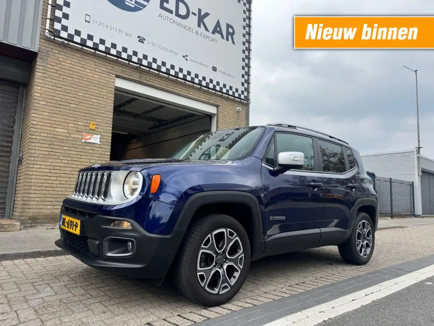 Jeep Renegade 1.4 MultiAir Limited AWD 170pk NL-AUTO TOP CONDITI Blauw - 1