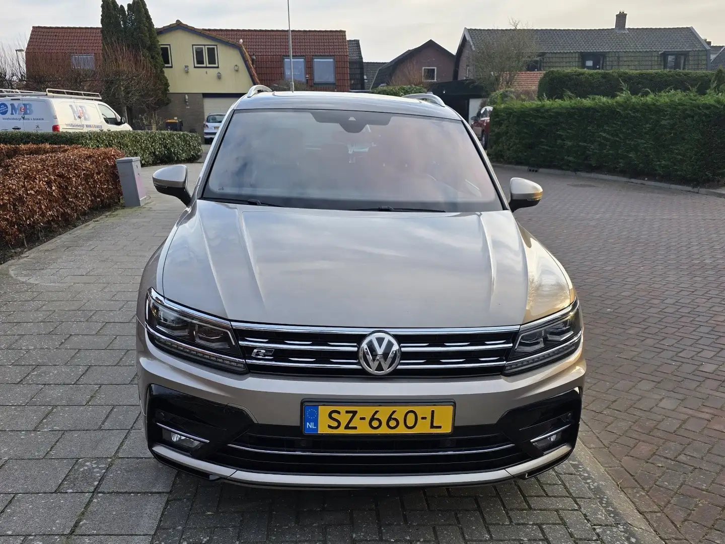 Volkswagen Tiguan 1.4 TSI Highl. Bus R Bronz - 1