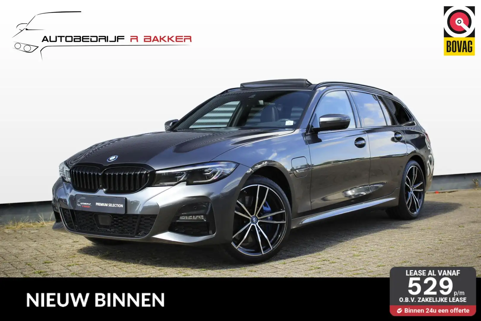 BMW 330 3-serie Touring 330e xDrive M Sport // Panoramadak Grijs - 1