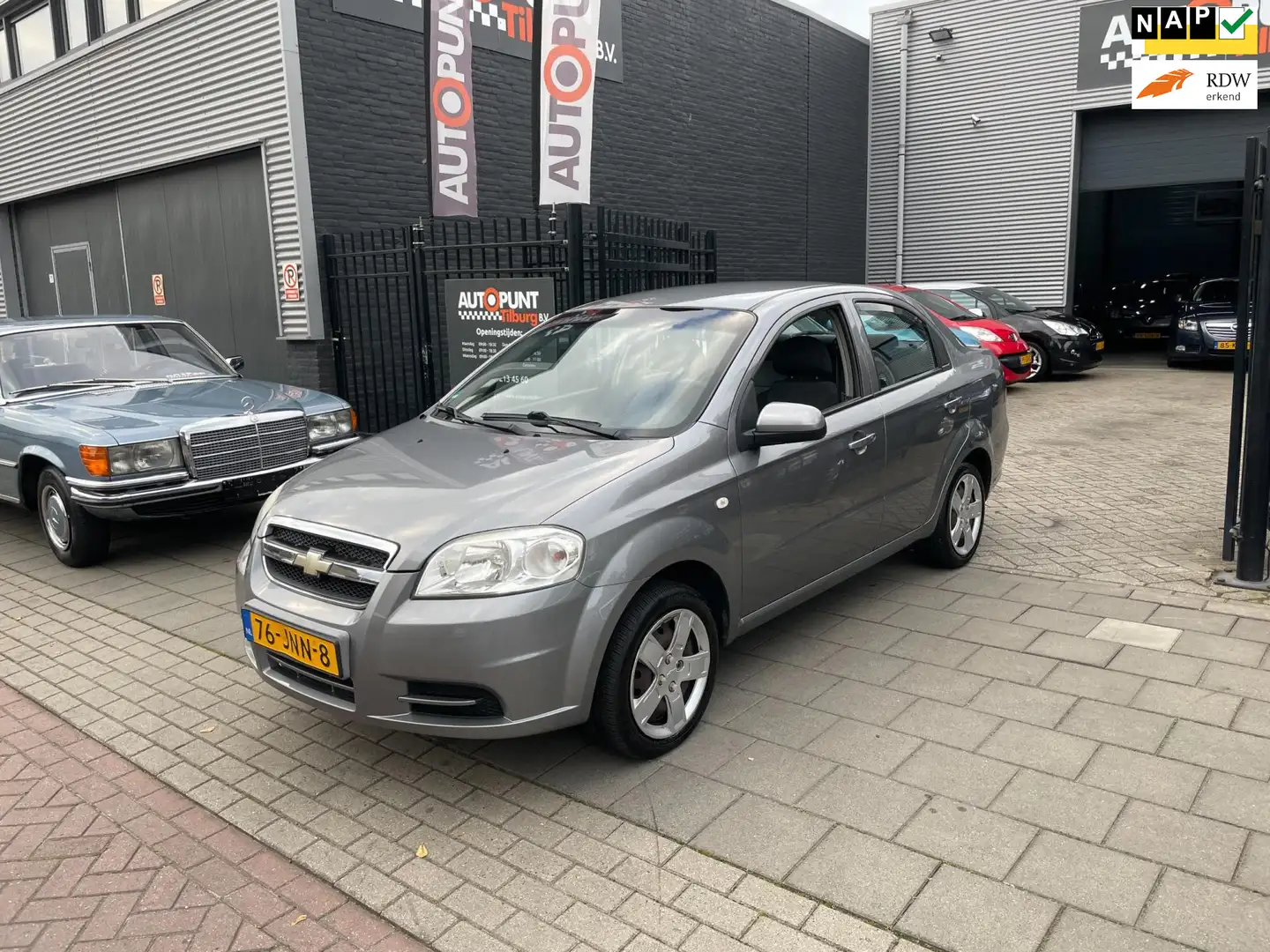Chevrolet Aveo 1.4-16V Style 3e Eigenaar! Trekhaak Airco NAP APK Gris - 1