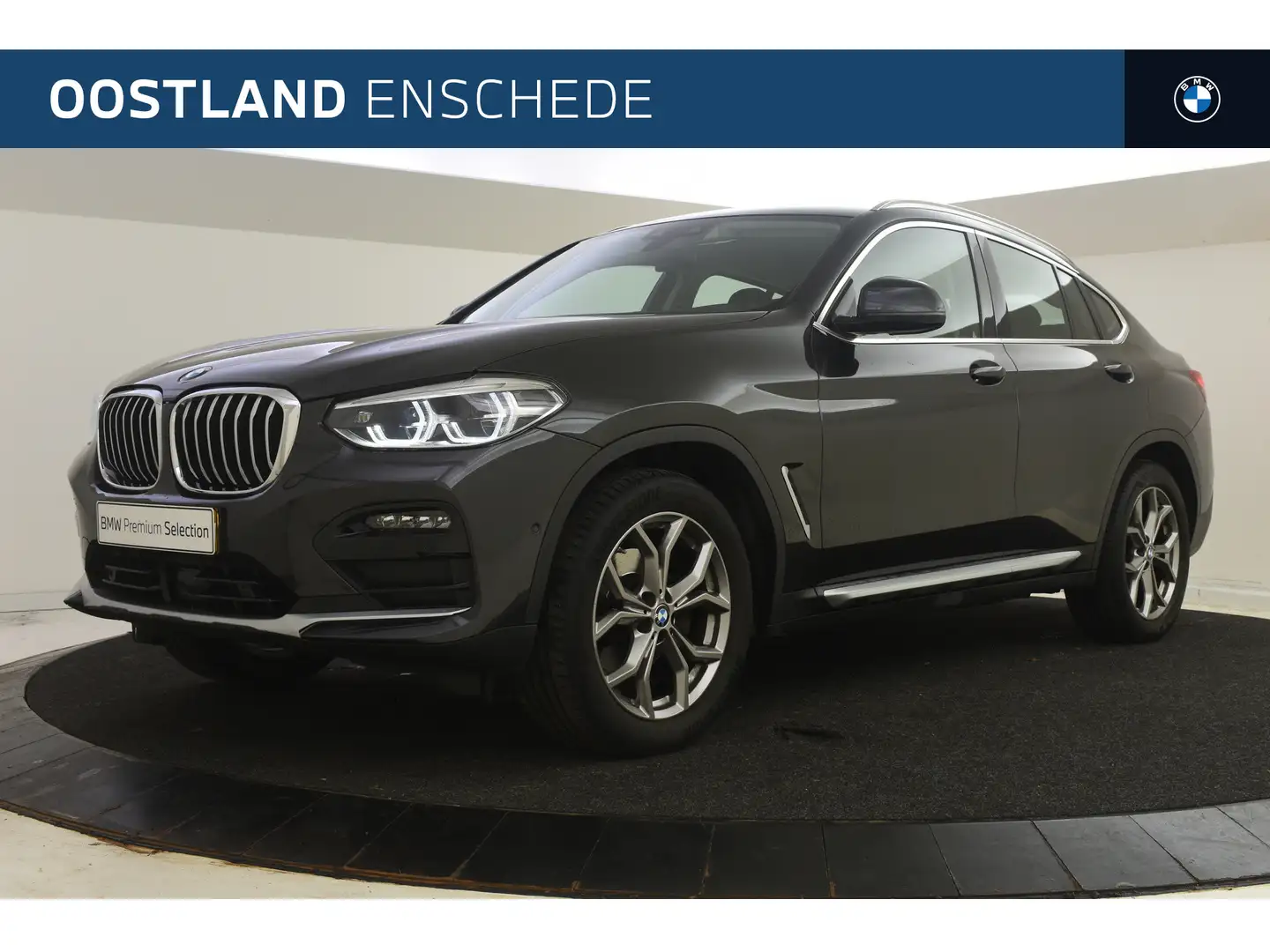 BMW X4 xDrive20i xLine Automaat / Sportstoelen / Trekhaak Grijs - 1