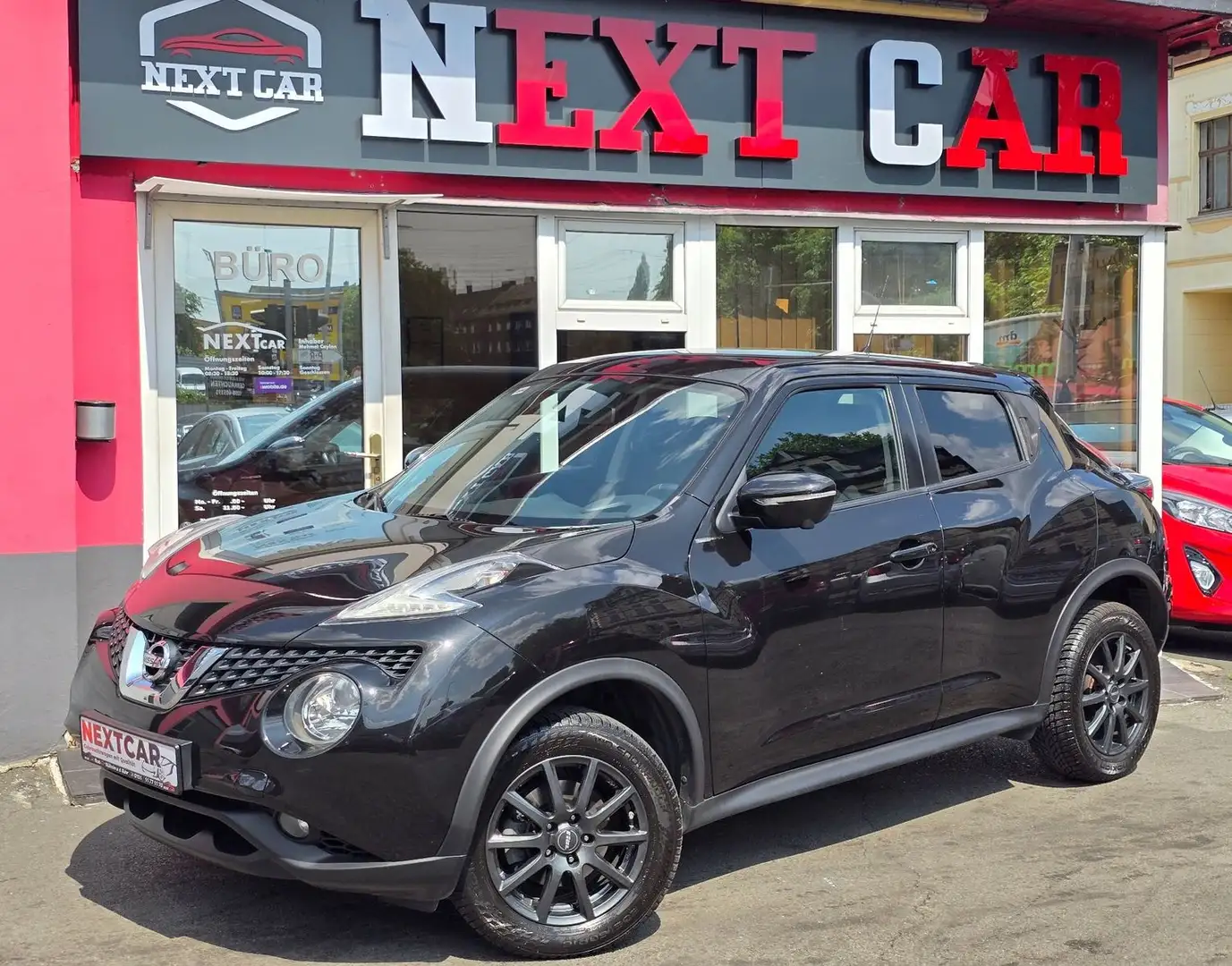 Nissan Juke 1.6 Acenta 4x2/Auto/360°/Navi/wenigKM Schwarz - 1