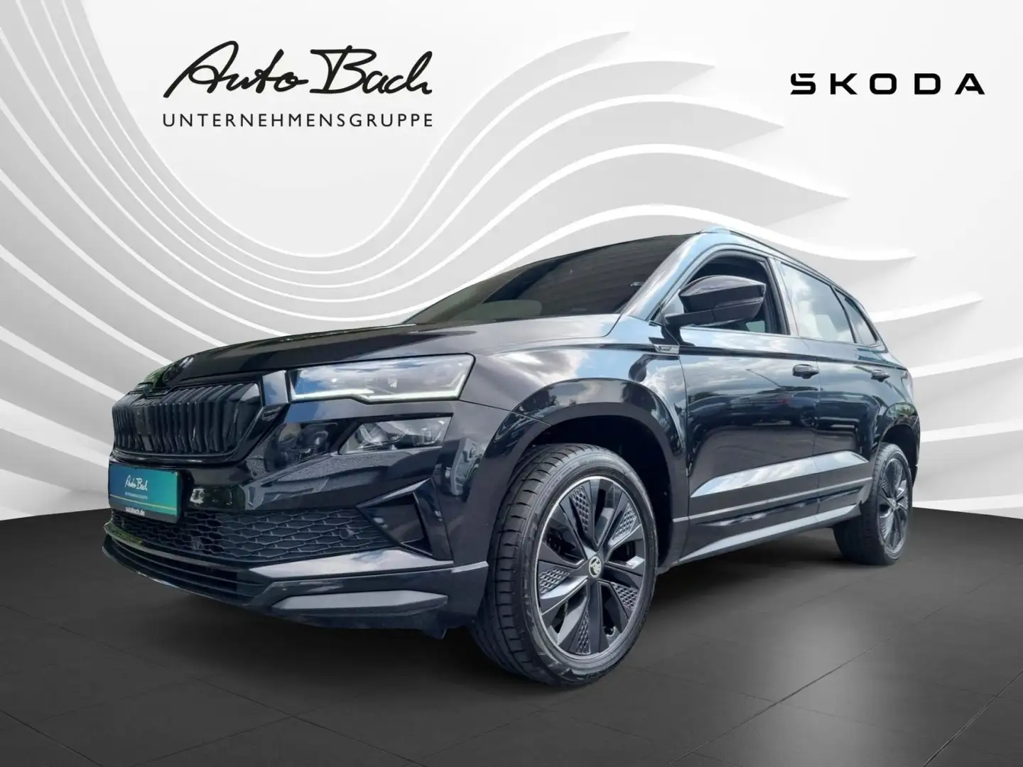 Skoda Karoq 1.5 TSI Sportline DSG Navi LED DCC CarPlay Schwarz - 1