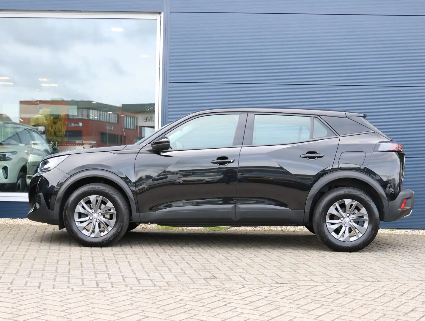 Peugeot 2008 1.2 PureTech Active Pack Navigatie d.m.v. Apple Ca Negro - 2