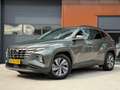 Hyundai TUCSON 1.6 T-GDI MHEV Comfort Smart | Dealer | Navi | Car Grijs - thumbnail 1