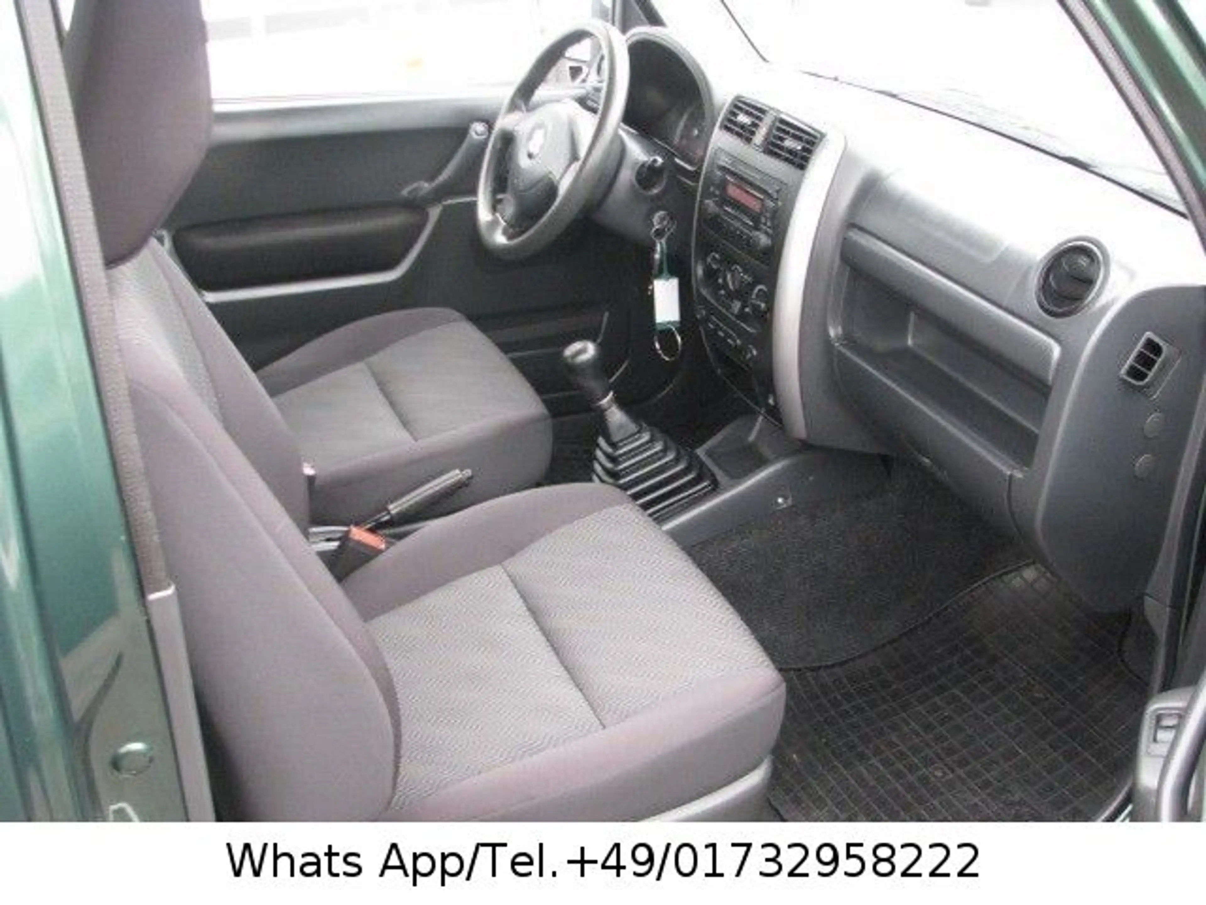 Suzuki Jimny 1.3 4WD Comfort"1-Hand"66tkm" — photo 17
