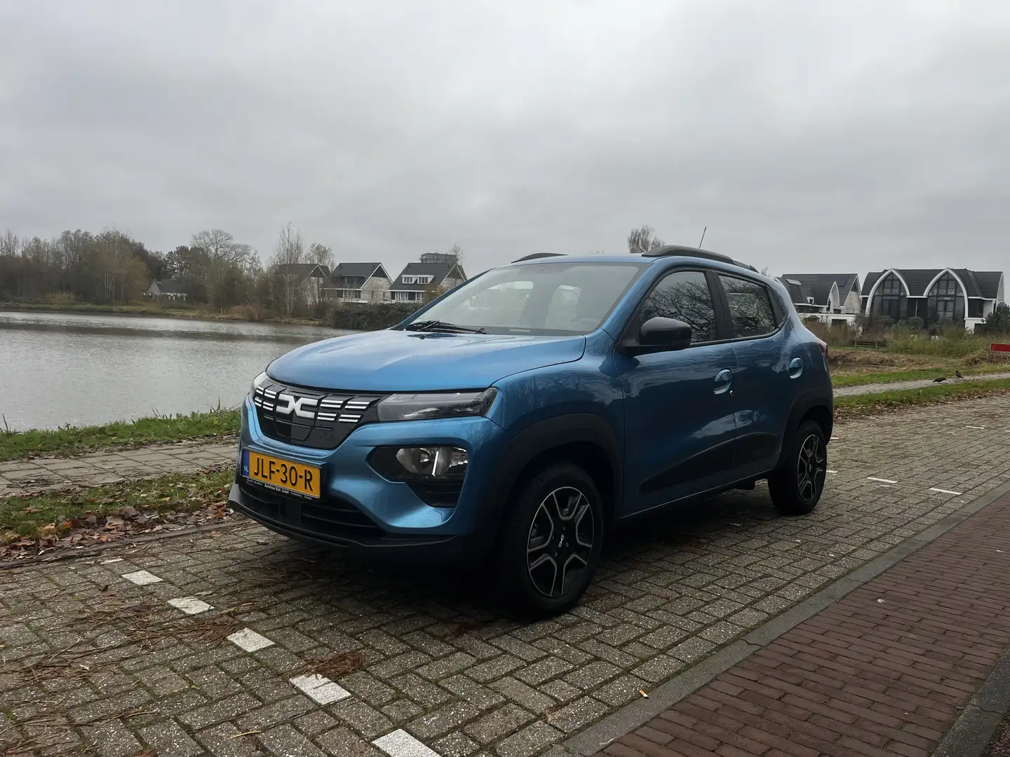 Dacia Spring Extreme Carplay Parkeercamera Fastcharge parksens Blauw - 1