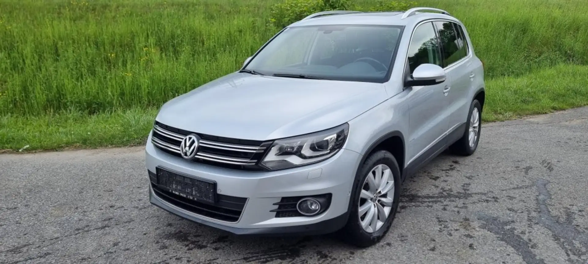Volkswagen Tiguan 2,0 TDI BMT 4Motion Sky DPF DSG Zilver - 1