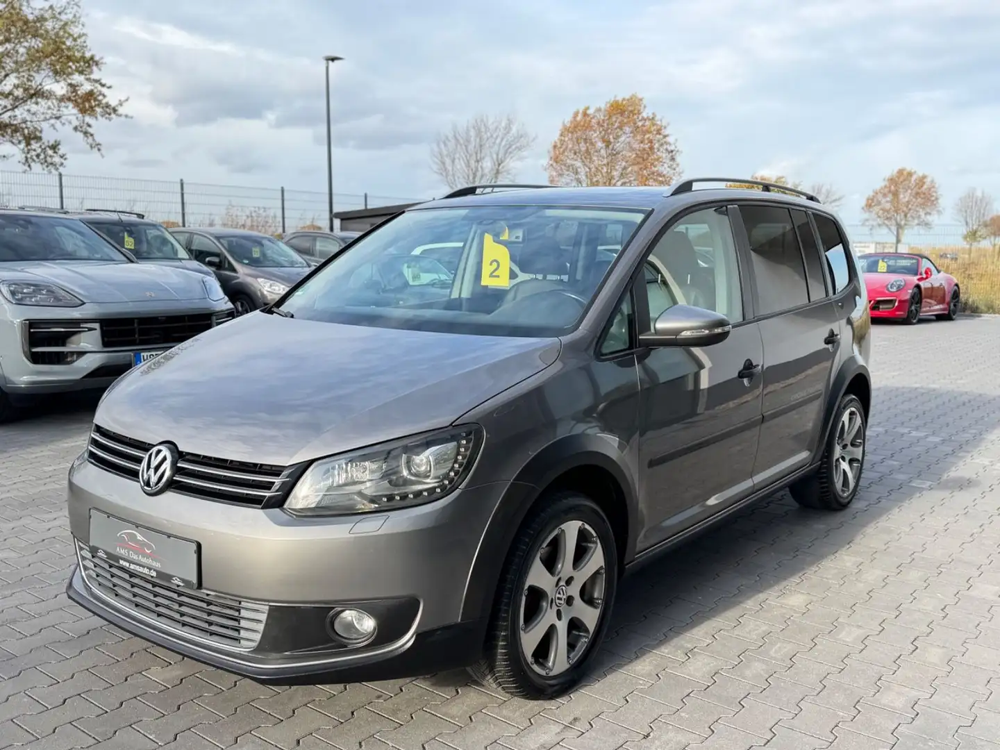 Volkswagen Touran Cross 1.4 TSI Pano. Leder Navi 7 Sitzer Grau - 1