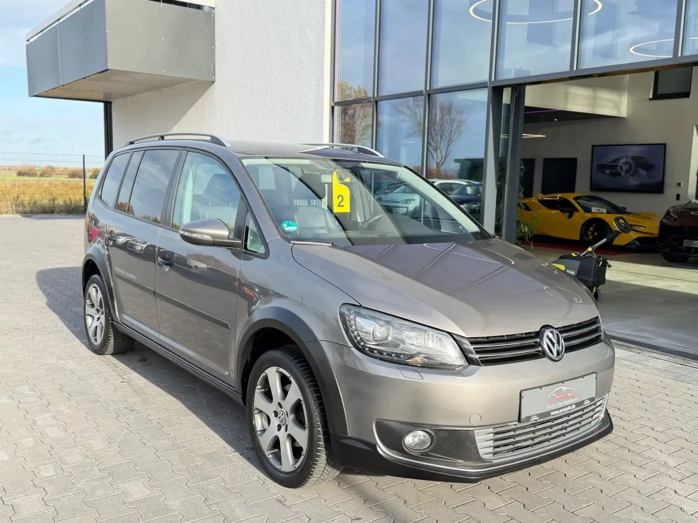 Volkswagen Touran Cross 1.4 TSI Pano. Leder Navi 7 Sitzer Grau - 2