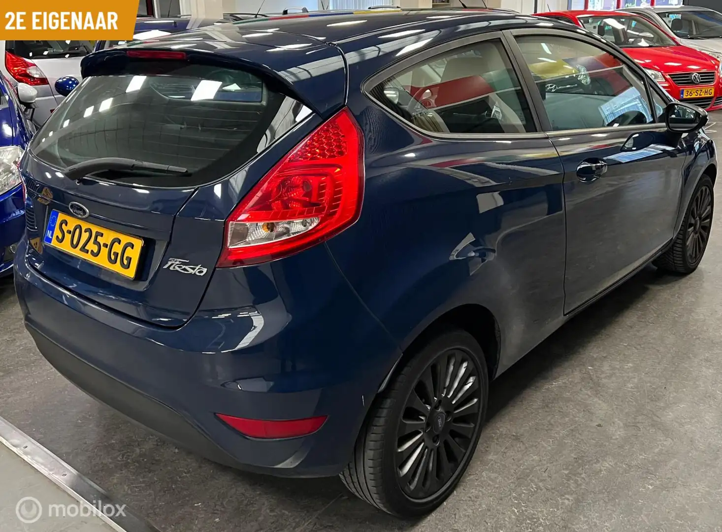 Ford Fiesta 1.25 Ghia 2e Eigenaar - Navigatie - Airco Bleu - 2