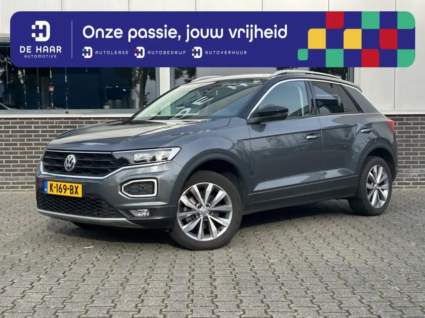 Volkswagen T-Roc 1.5 TSI Sport Automaat - Navi - Parkeercamera - Cr Gris - 1