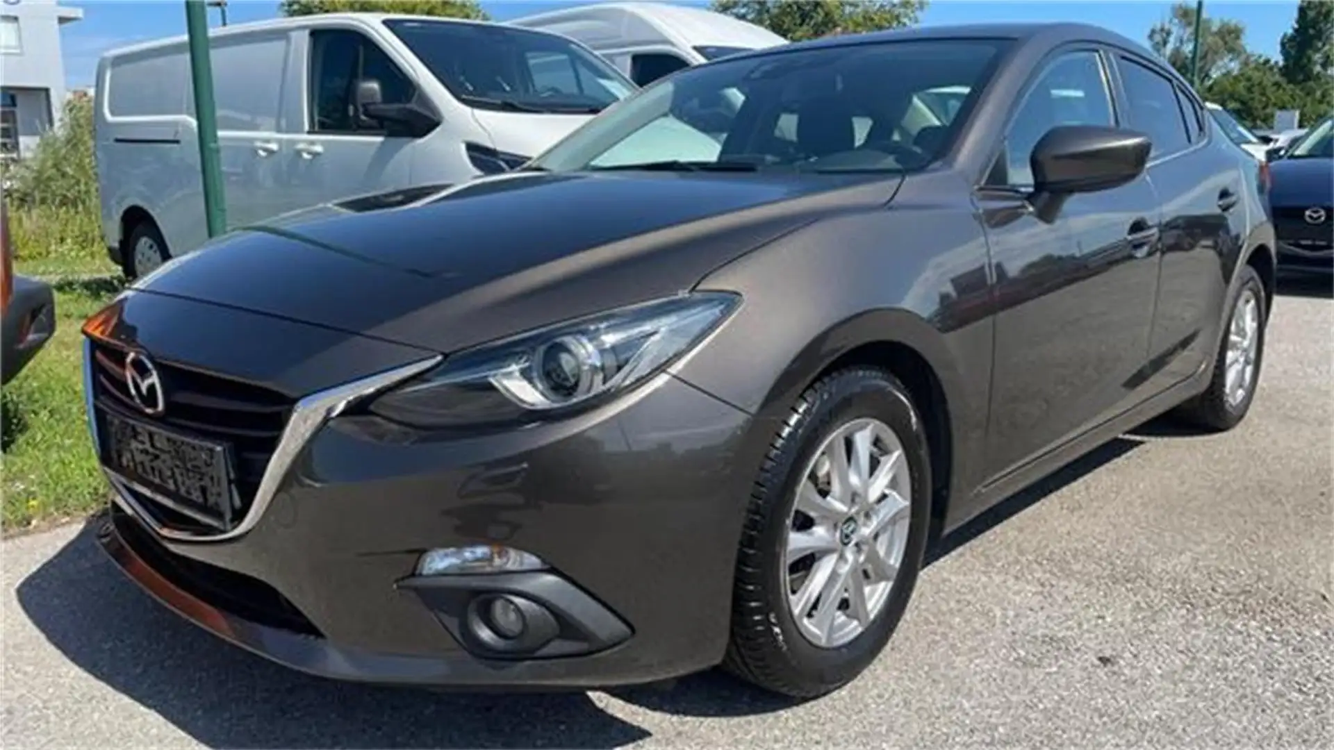 Mazda 3 G100 Attraction Limousine mit Navigation - 1