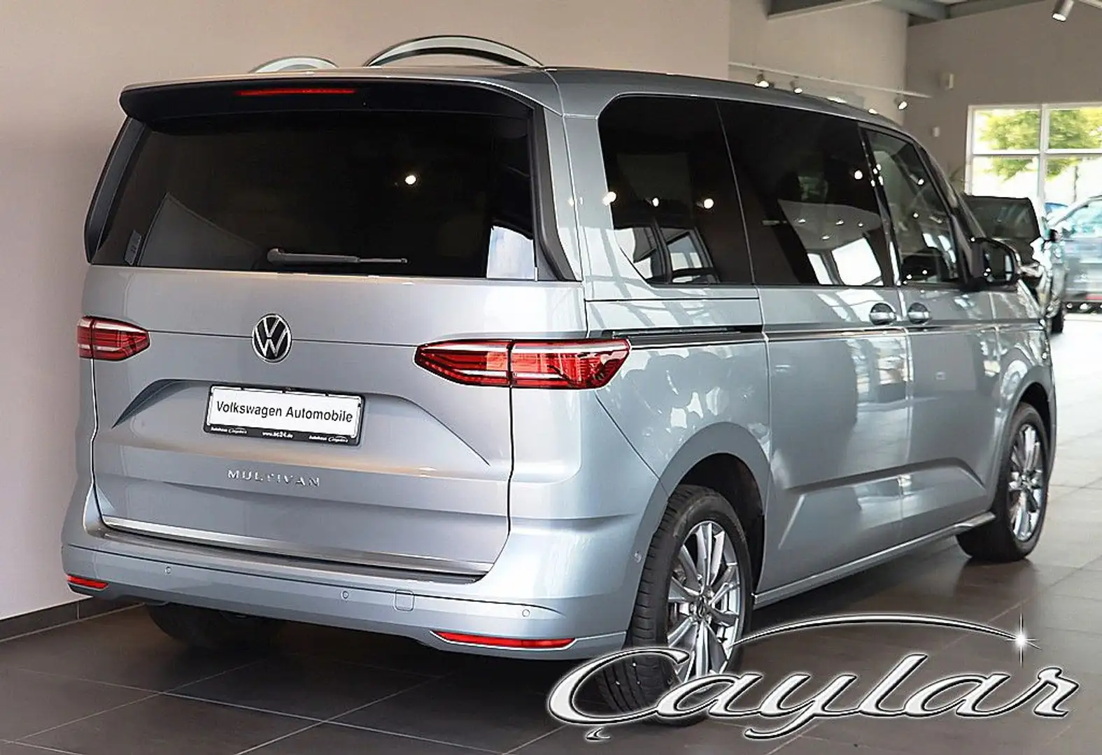 Volkswagen T7 Multivan T7 MULTIVAN 2,0 TSI DSG MASSAGE PANO HUD STANDHZ Grijs - 2