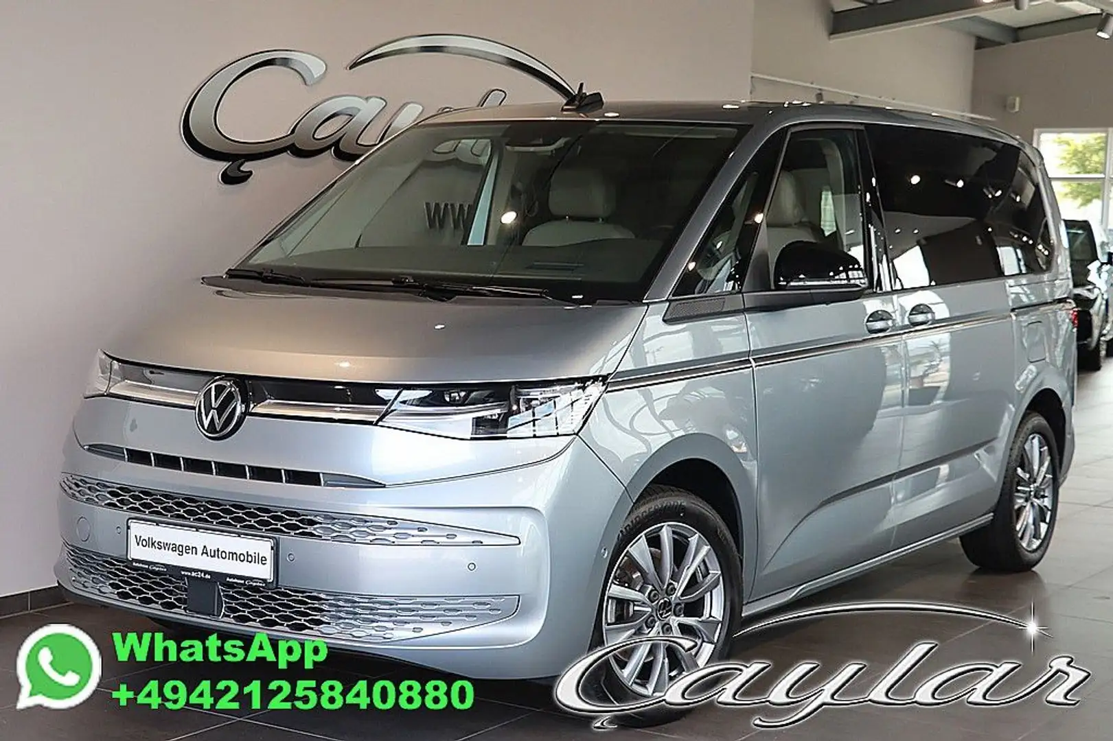 Volkswagen T7 Multivan T7 MULTIVAN 2,0 TSI DSG MASSAGE PANO HUD STANDHZ Grijs - 1
