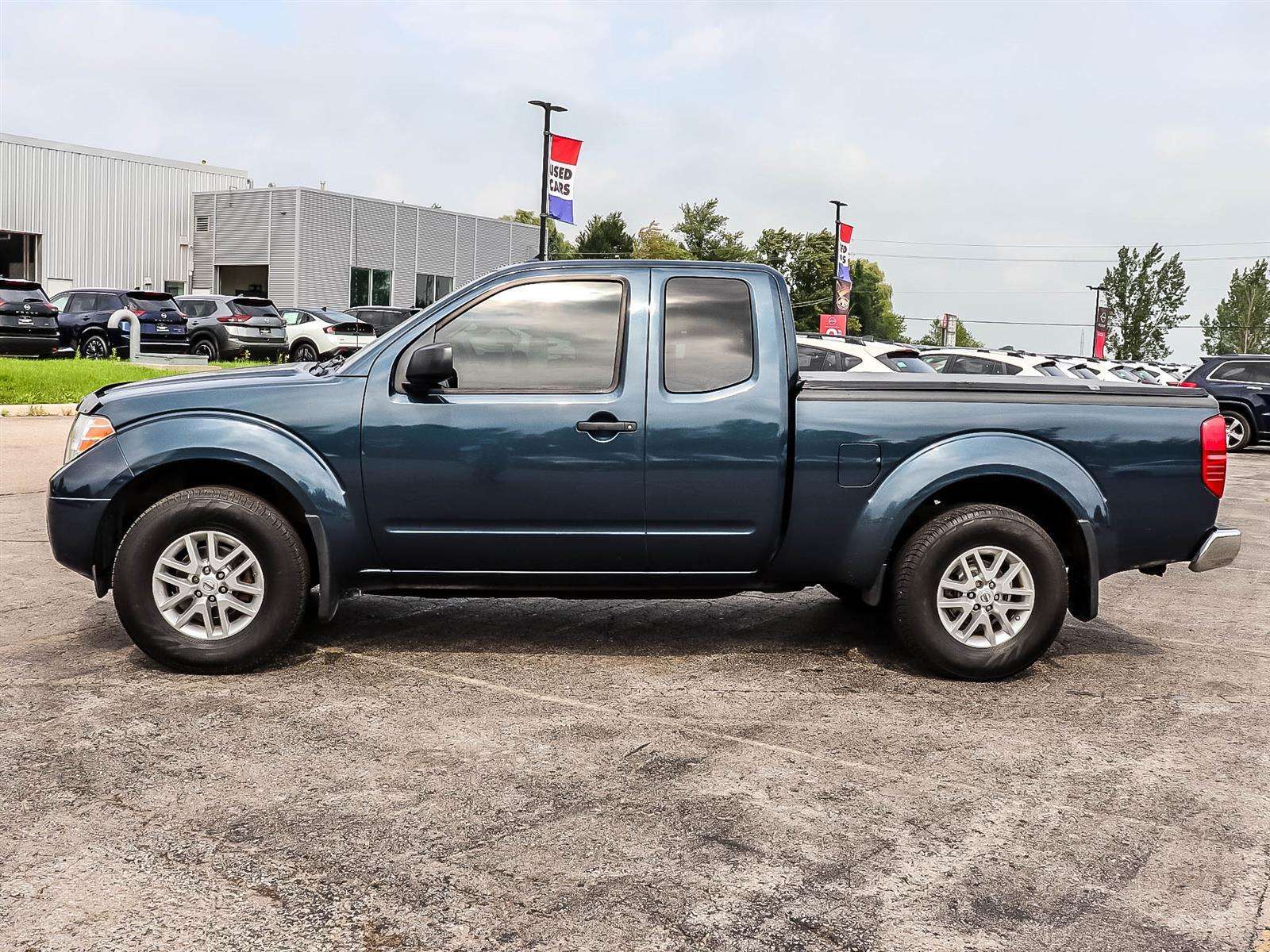 2015 Nissan Frontier NissanConnect | AC | AM/FM/CD Audio | Bluetooth — снимка 1
