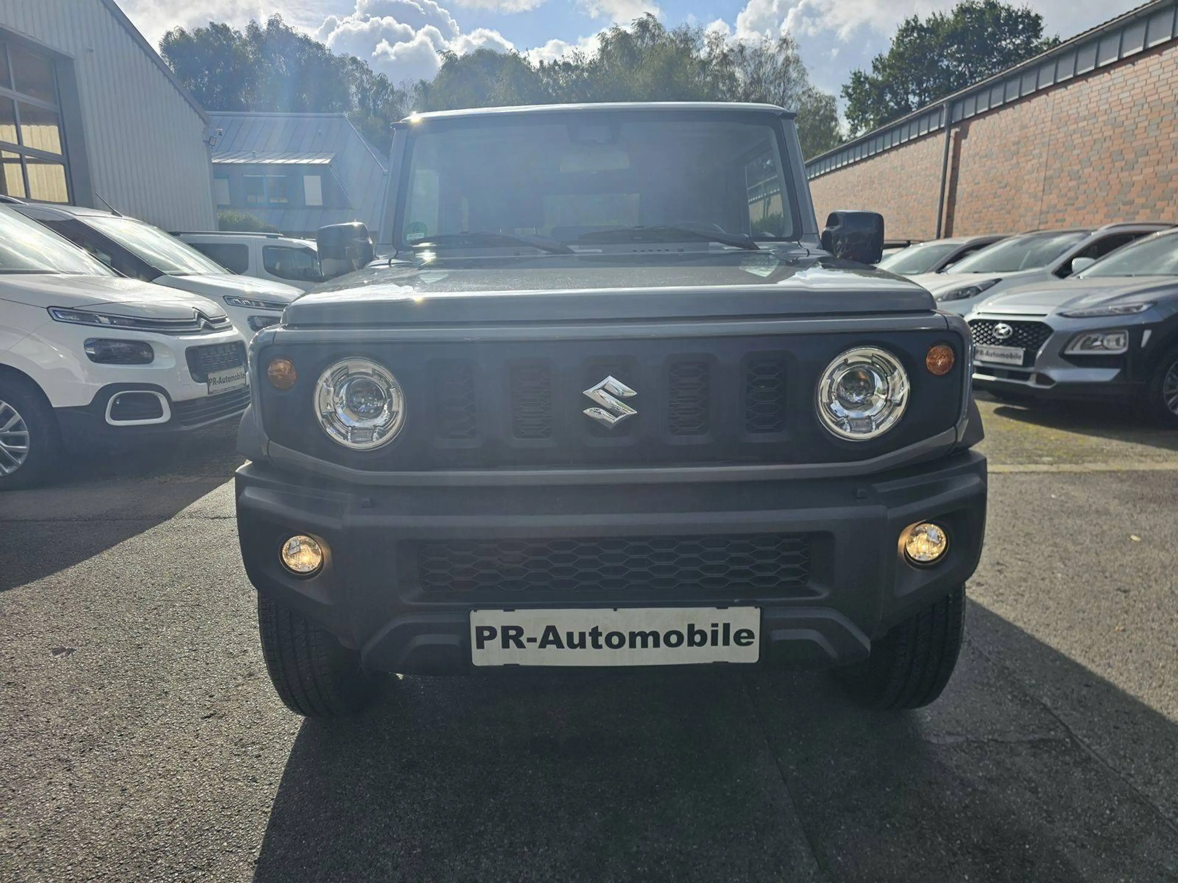 Suzuki Jimny Comfort+ AllGrip Klimaaut/Navi+Cam/Alu — photo 2