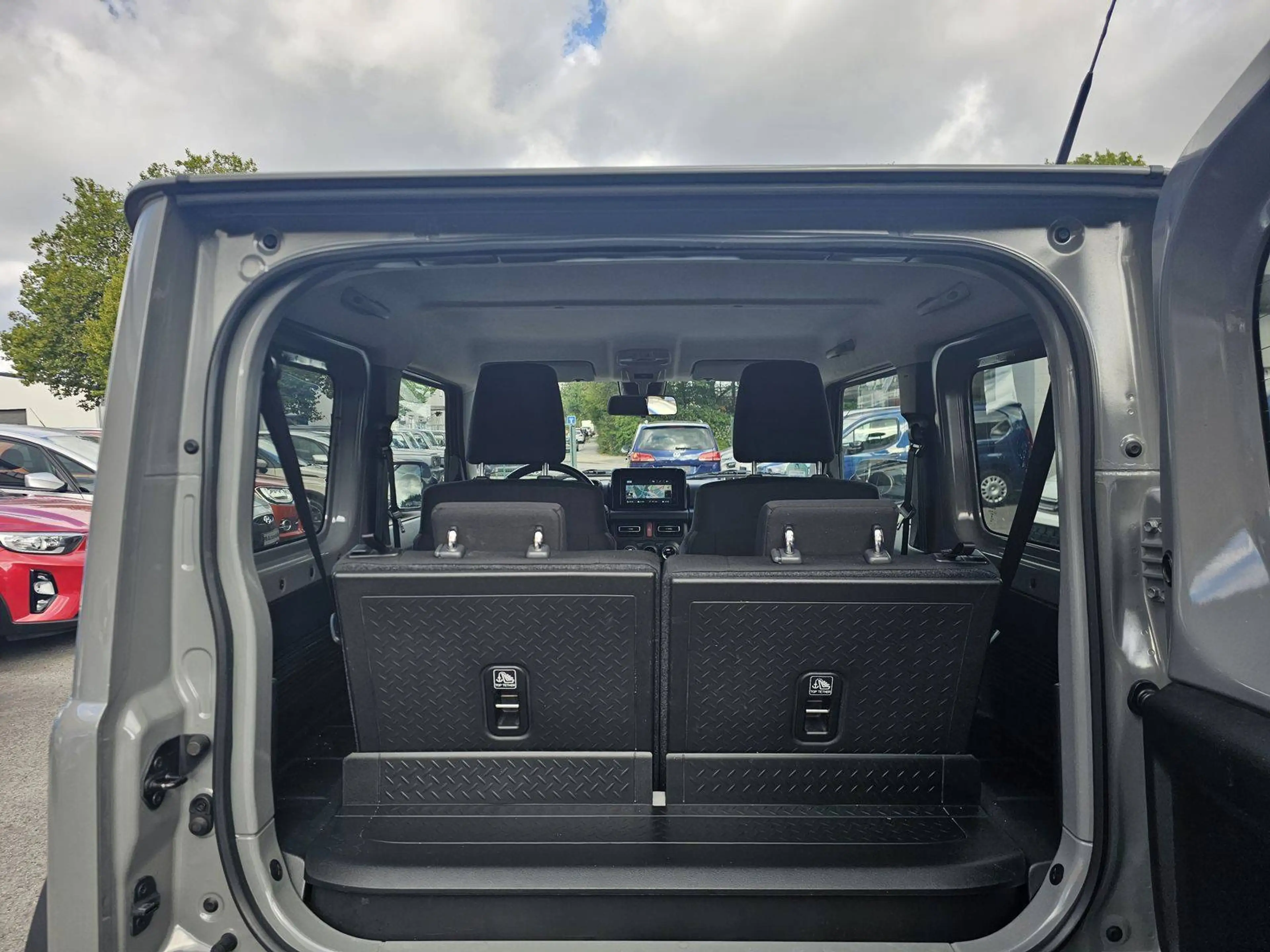 Suzuki Jimny Comfort+ AllGrip Klimaaut/Navi+Cam/Alu — photo 10