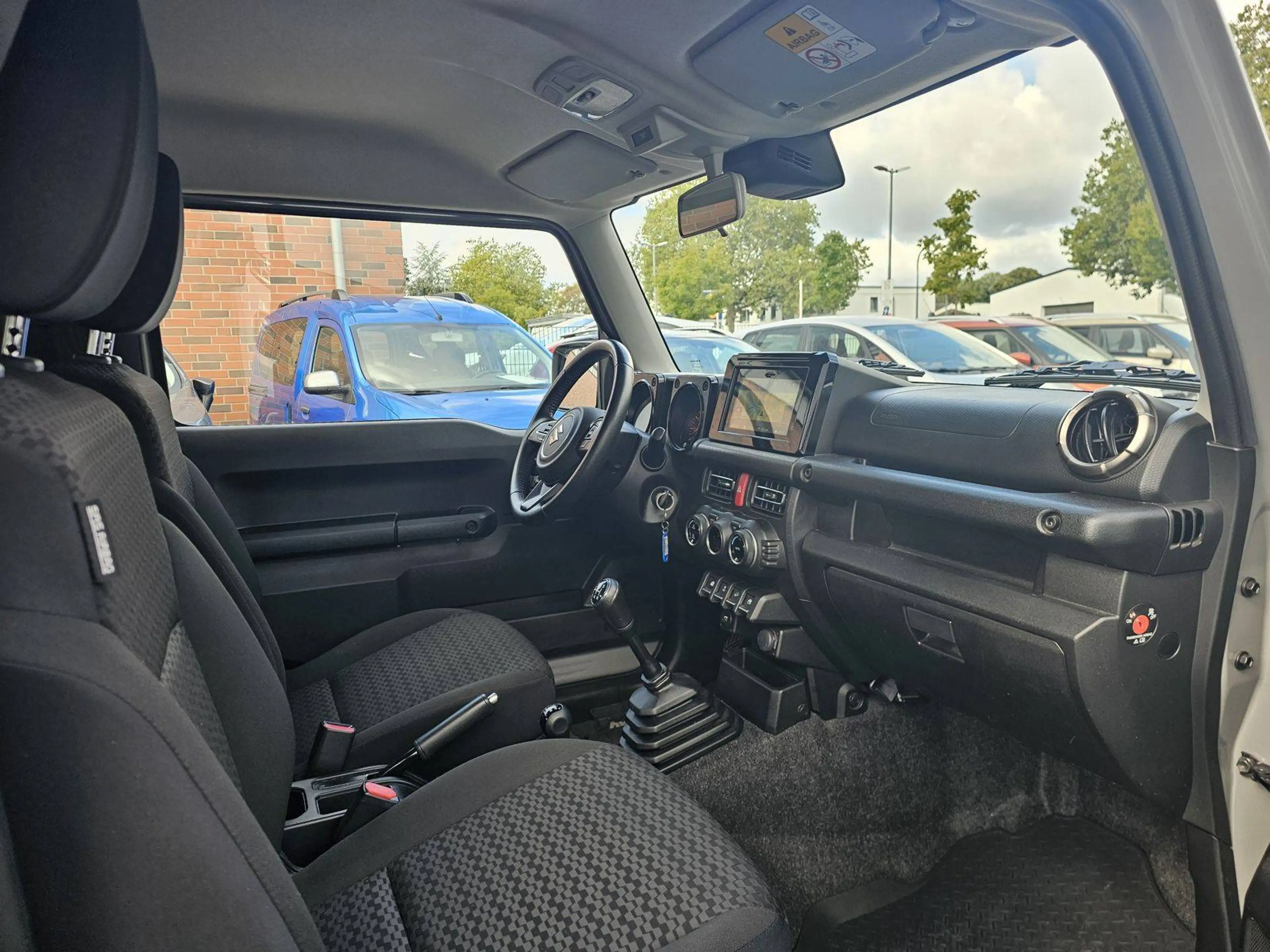 Suzuki Jimny Comfort+ AllGrip Klimaaut/Navi+Cam/Alu — photo 13