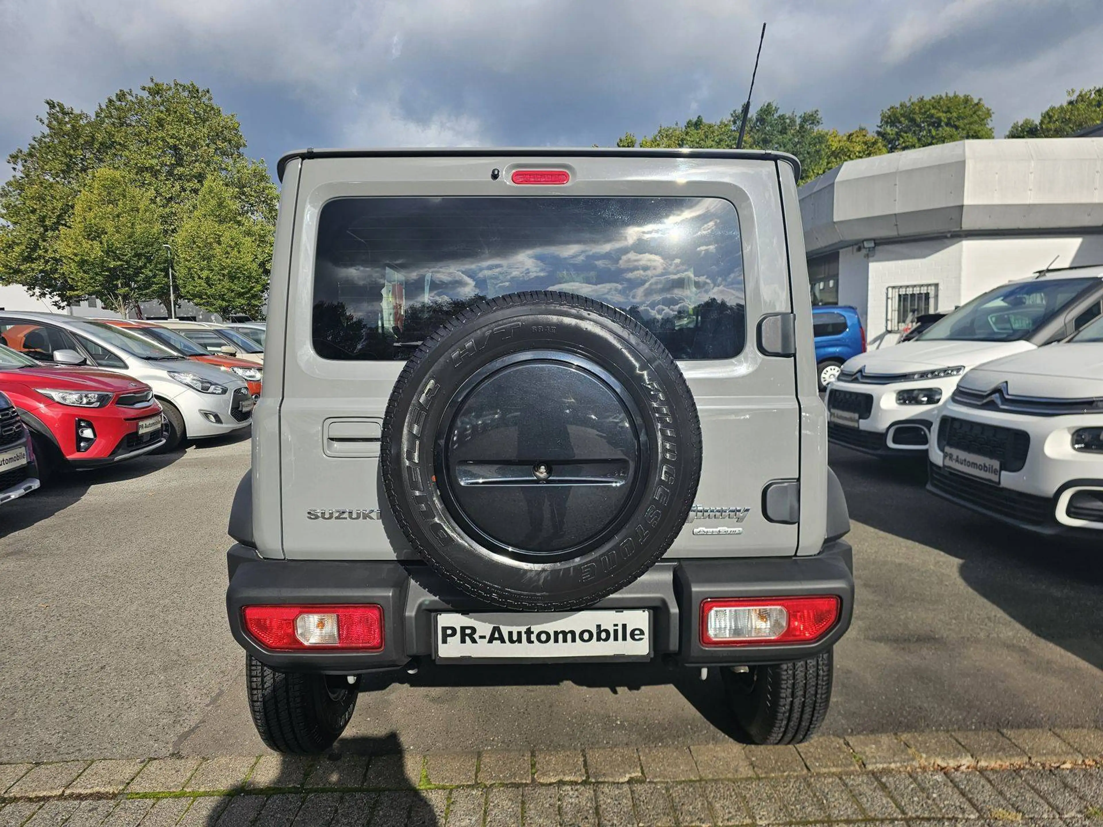 Suzuki Jimny Comfort+ AllGrip Klimaaut/Navi+Cam/Alu — photo 5