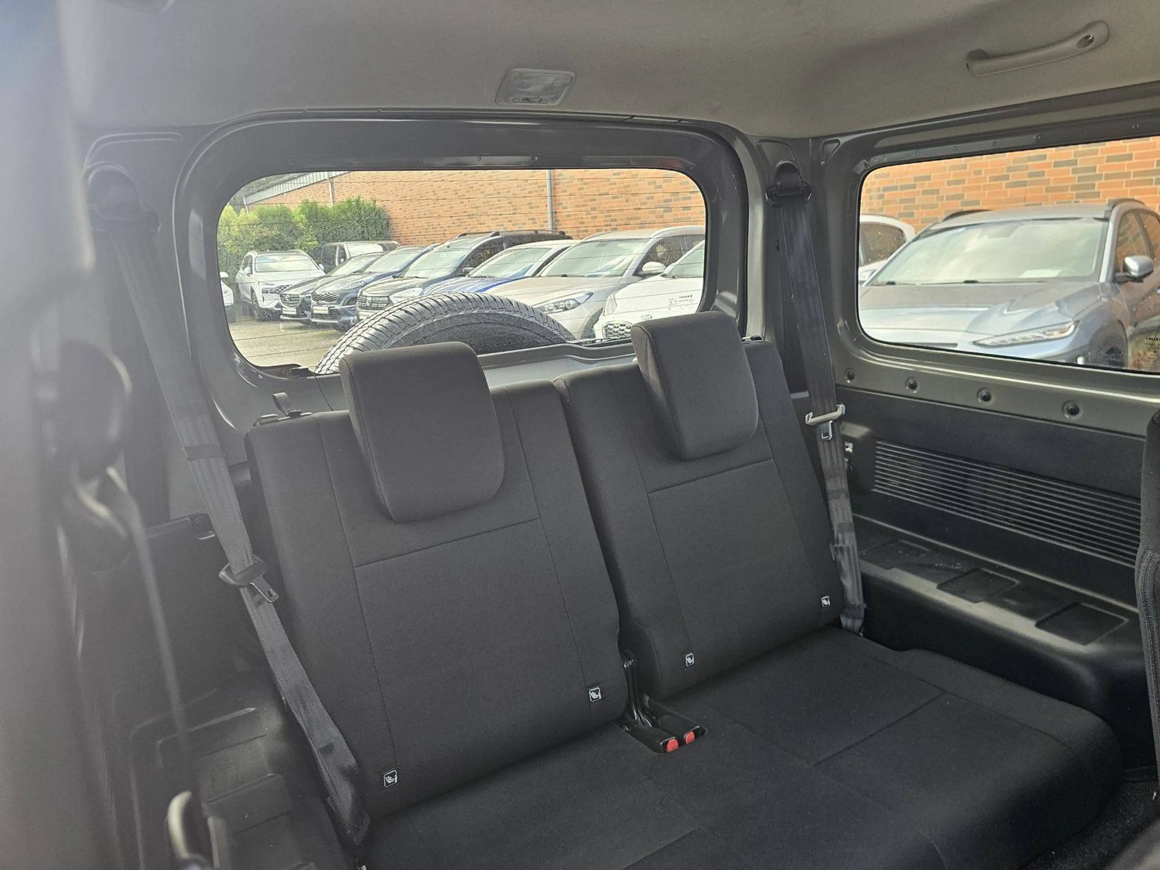 Suzuki Jimny Comfort+ AllGrip Klimaaut/Navi+Cam/Alu — photo 12