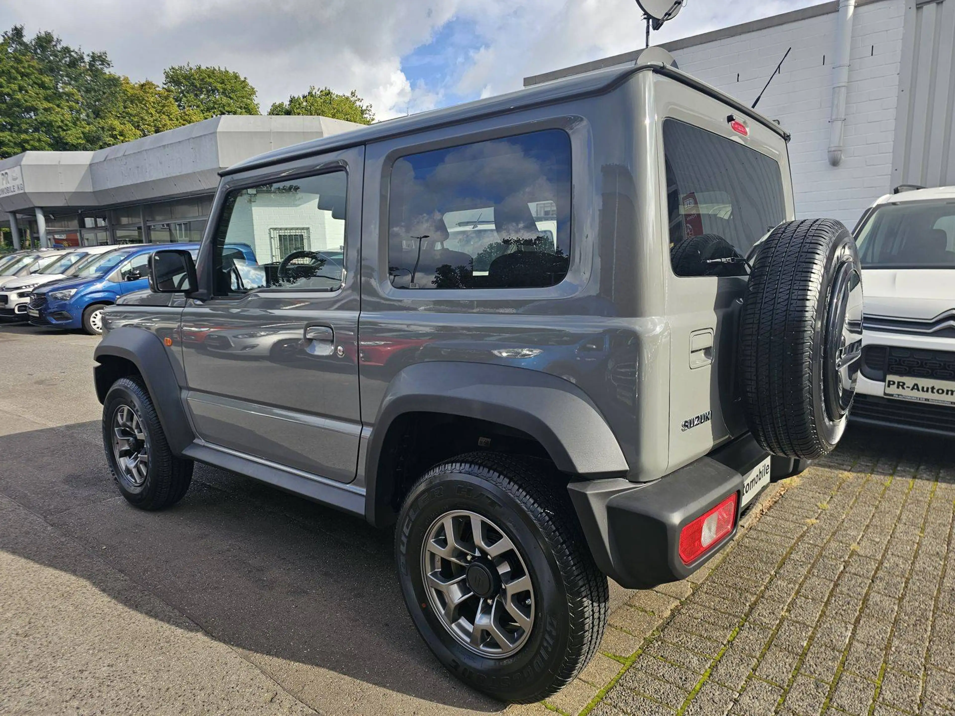 Suzuki Jimny Comfort+ AllGrip Klimaaut/Navi+Cam/Alu — photo 6