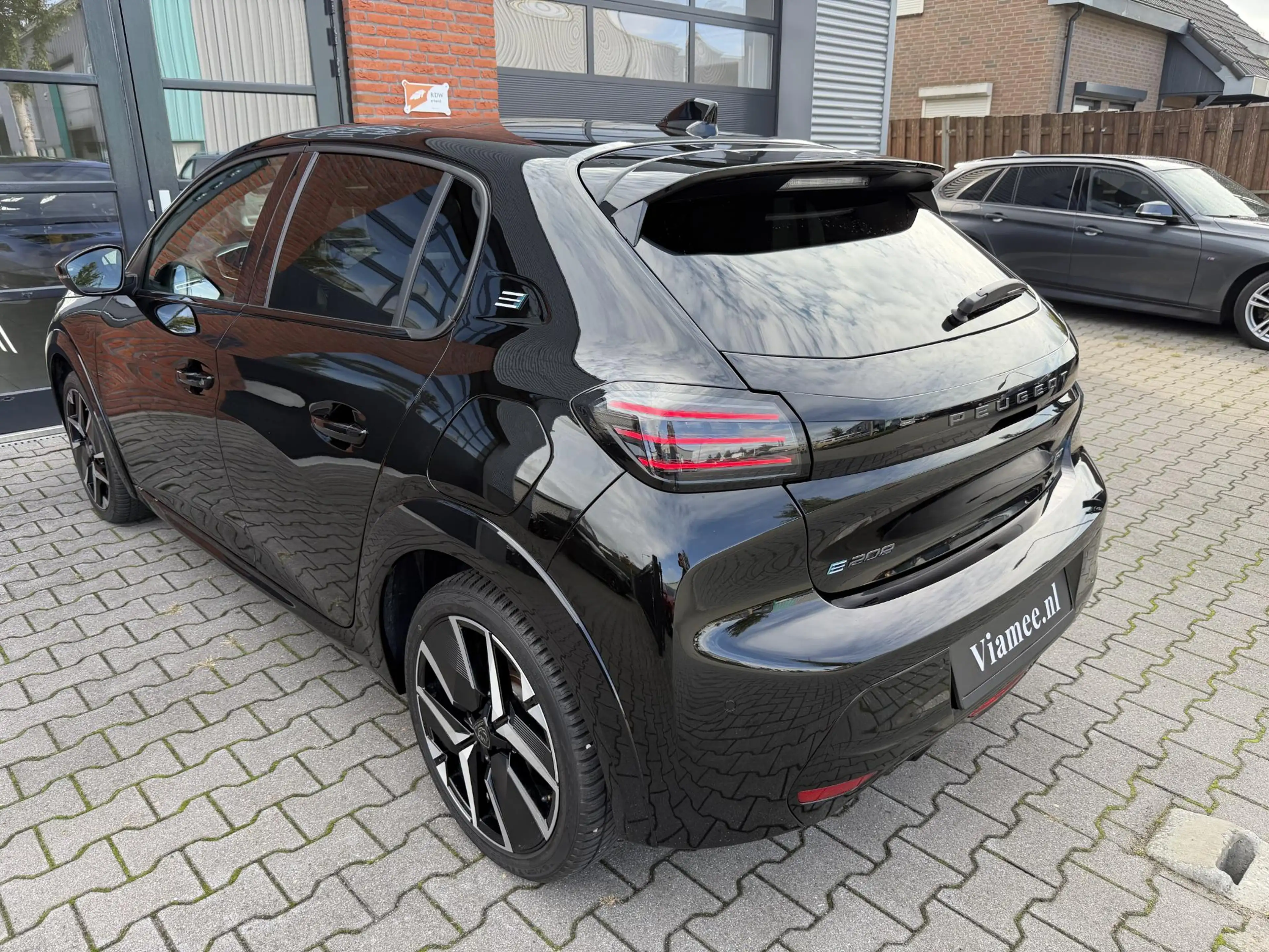 Peugeot e-208 EV GT Avantage 51 kWh | Pano | Massage | Warmtepom — photo 4