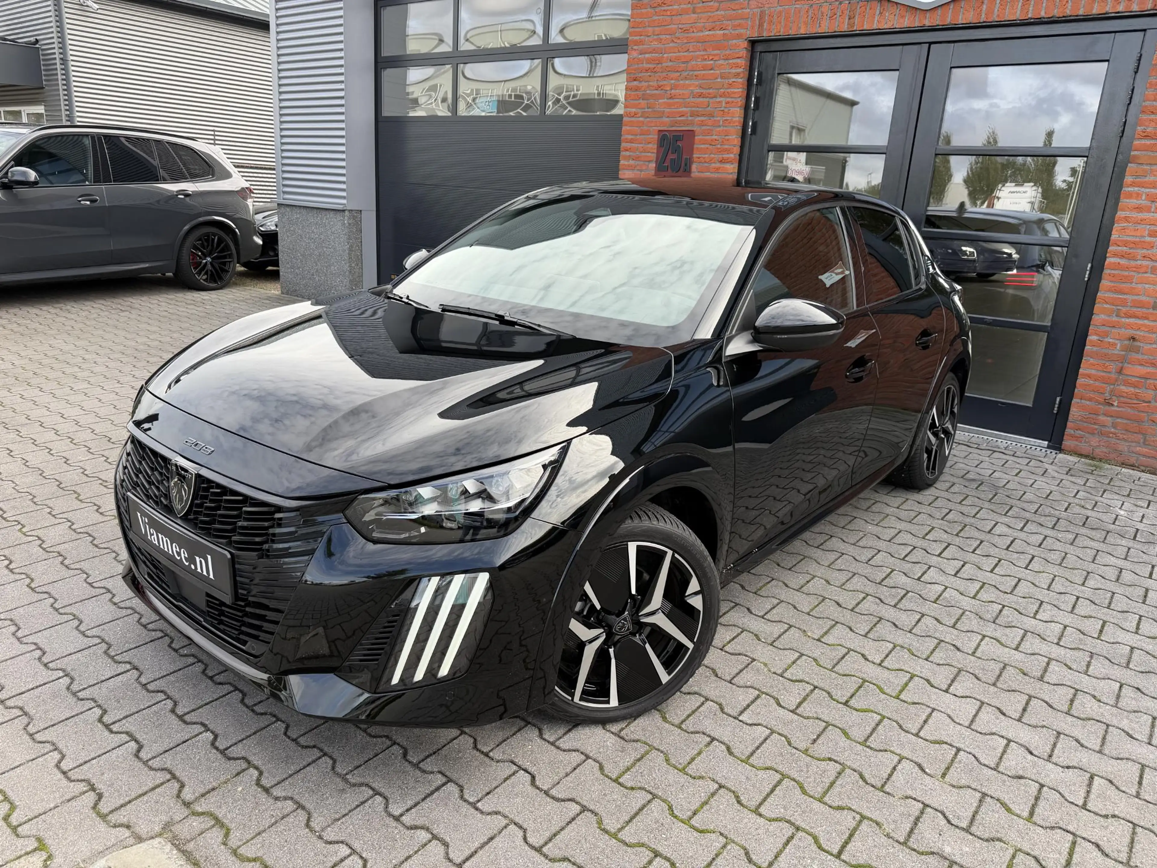 Peugeot e-208 EV GT Avantage 51 kWh | Pano | Massage | Warmtepom