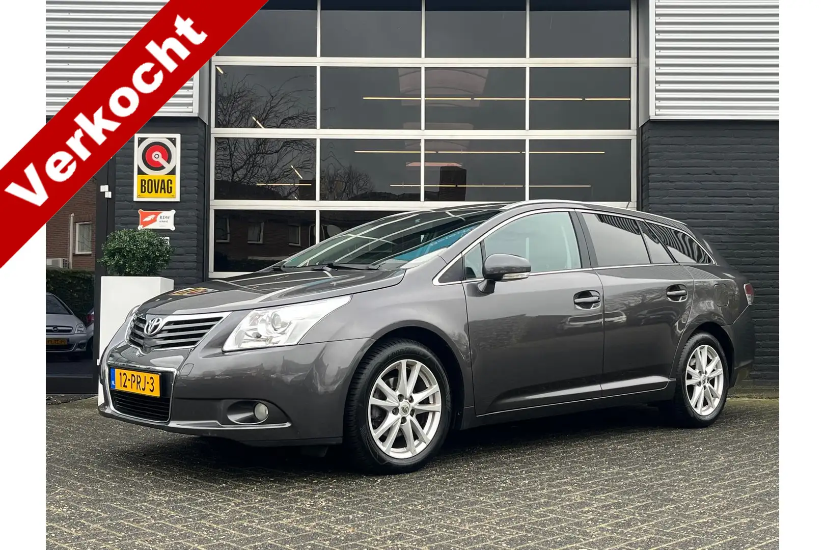 Toyota Avensis Wagon 1.8 VVTi, Airco, Bluetooth, Cruise, Trekhaak Grigio - 1
