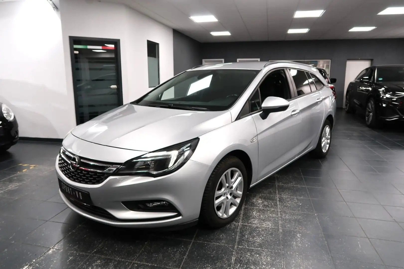 Opel Astra K Sports Tourer Edition Start/Stop/1-Hand Zilver - 1