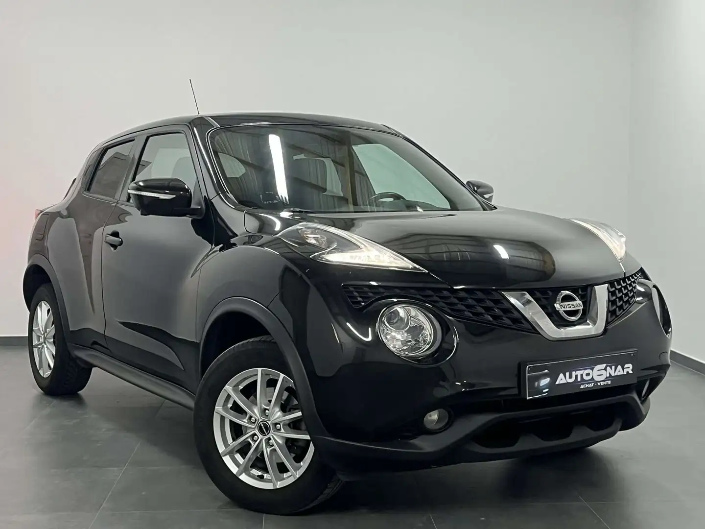 Nissan Juke 1.5 dCi 2WD - Airco - Navi - Camera - Carnet Noir - 1