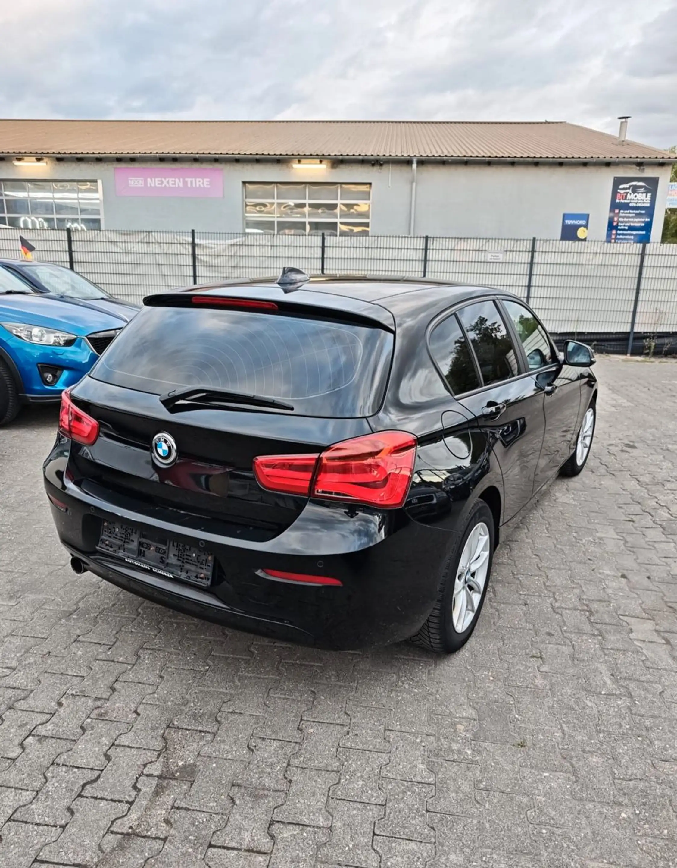 BMW 118 i Advantage — photo 11