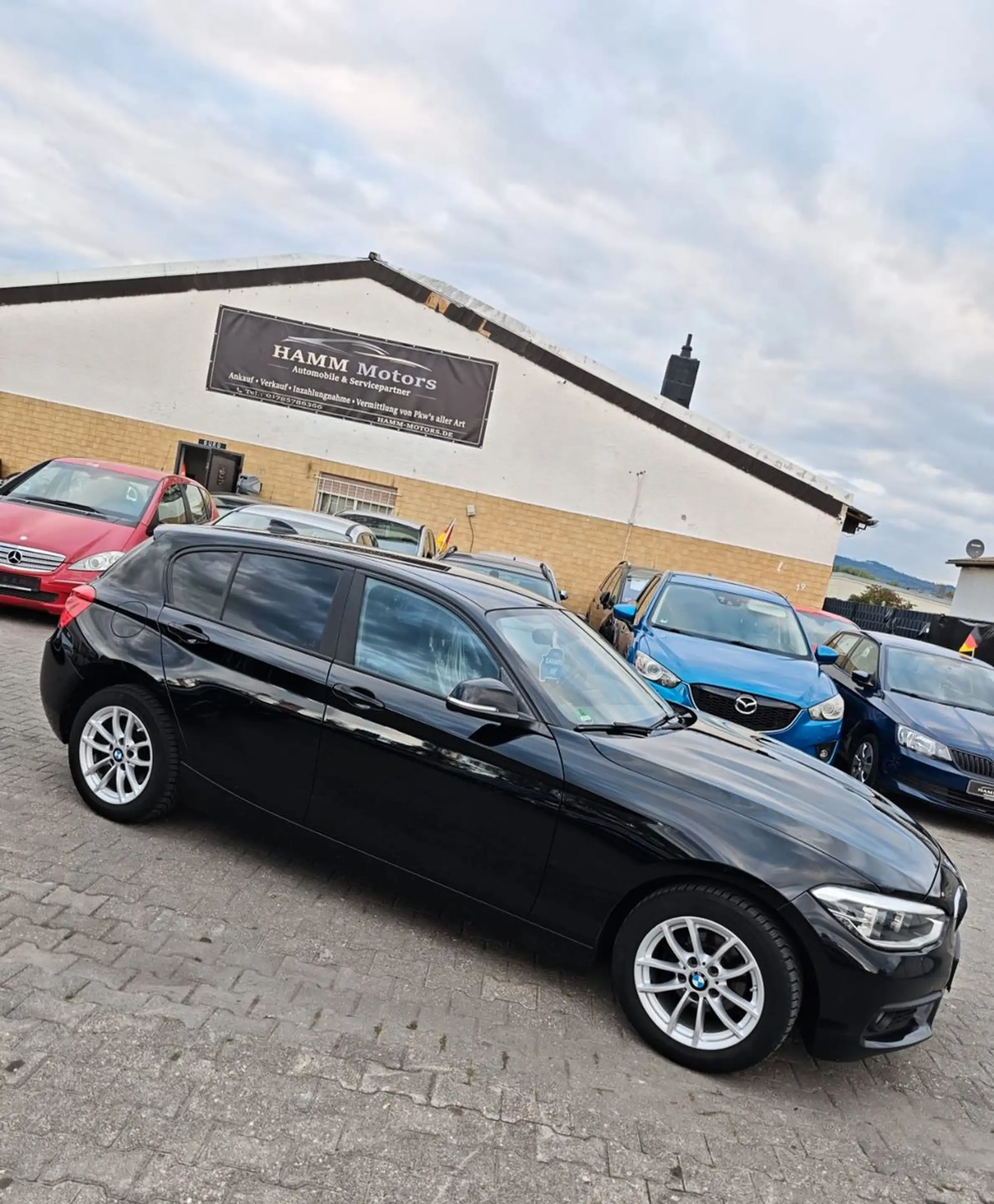 BMW 118 i Advantage — photo 8