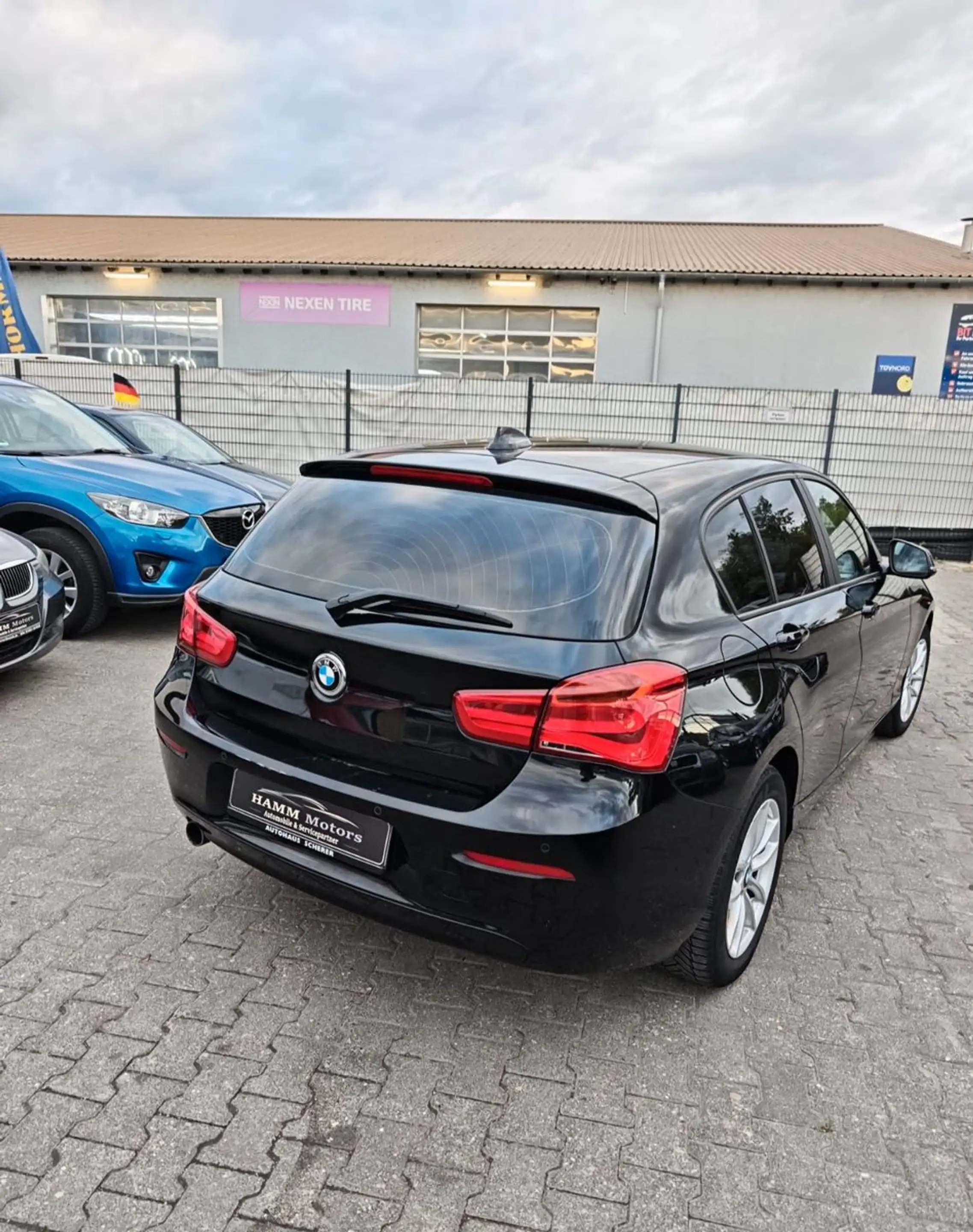 BMW 118 i Advantage — photo 9