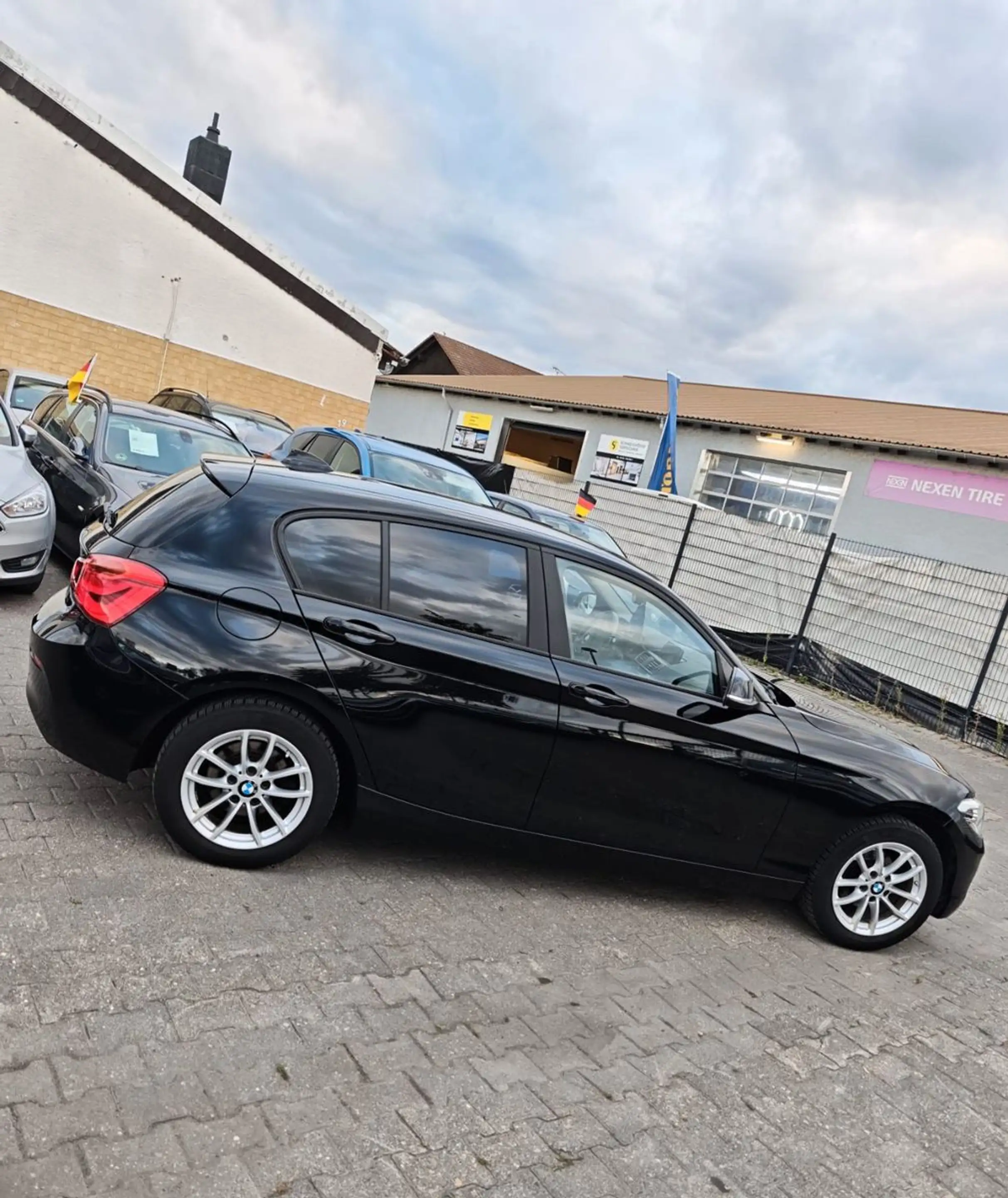 BMW 118 i Advantage — photo 7
