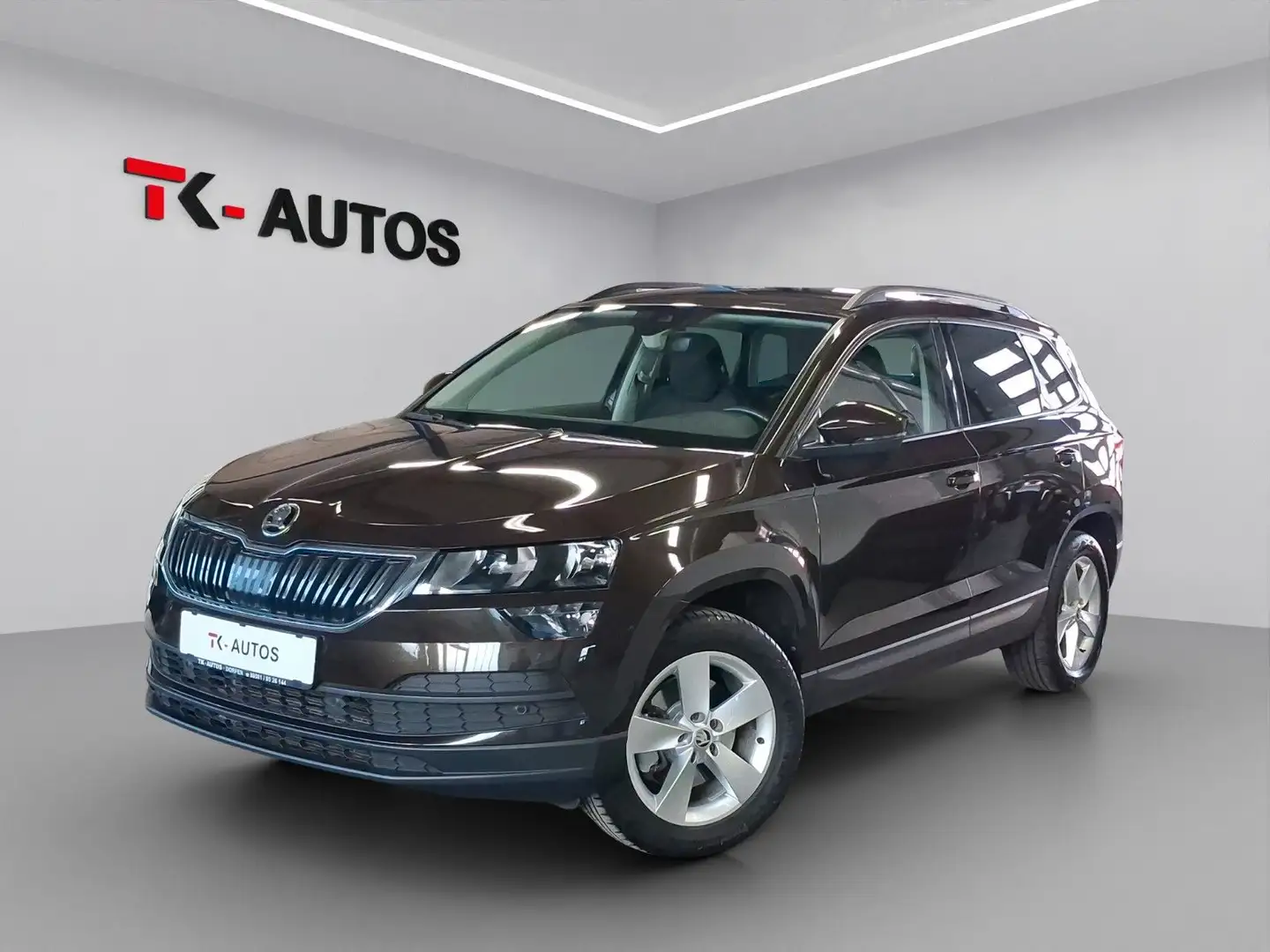 Skoda Karoq 2.0 TDI 4x4,1.Hand,Navi,ACC,AHK,Std-Heiz. Braun - 1