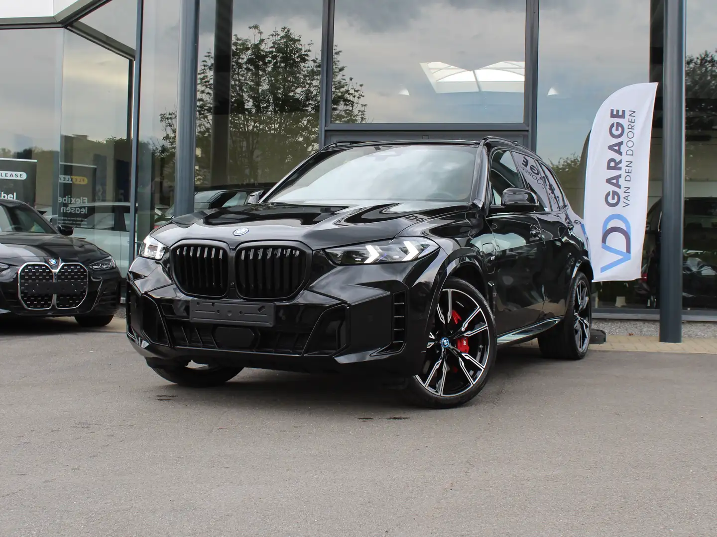 BMW X5 xDrive50e M Sport / SKYLOUNGE / HUD / 360CAM / TRK Zwart - 1