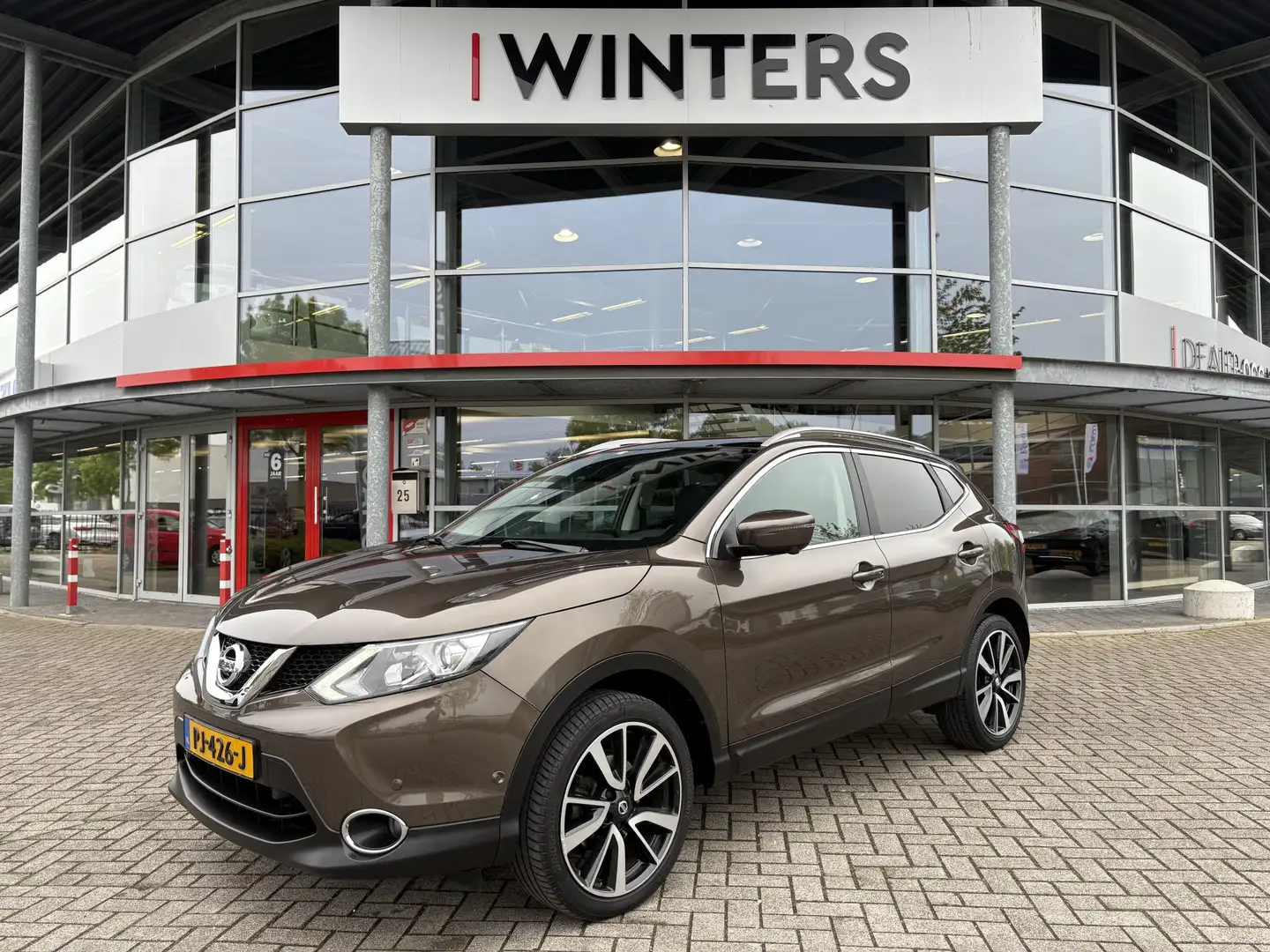 Nissan Qashqai 1.2 Tekna | Navi | 360°Camera | BT |  Trekhaak | L Brun - 1