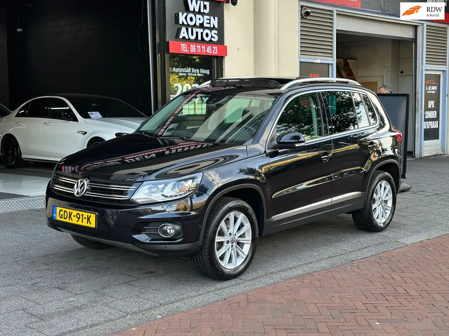 Volkswagen Tiguan 2.0 TSI Sport&Style 4Motion Automaat Leer Navi Pan Noir - 1