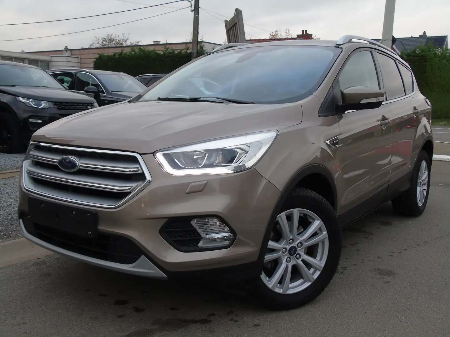 Ford Kuga 1.5 EcoBoost *1e Eigen*Navi* Keyless Go*Carplay Bronze - 1