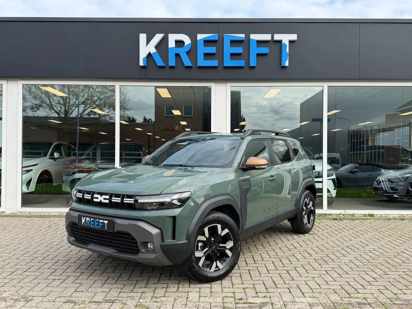 Dacia Duster 1.6 Hybrid 140 Extreme Groen! Groen - 1